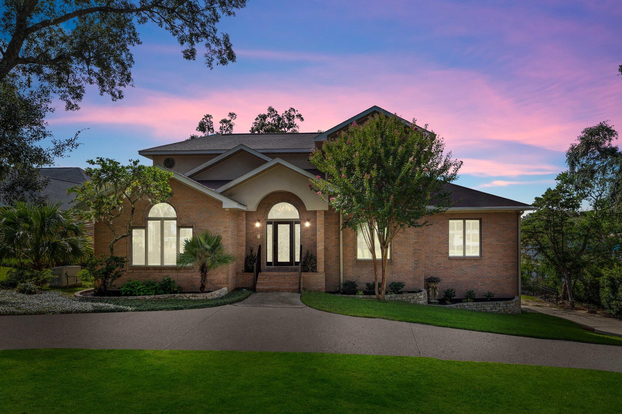 There's No Place Like Home and this WATERFRONT RETREAT offers the finest of Lake/Bayou living on Florida's Emerald Coast and boasts a variety of impressive features and amenities. **LOCATION AND SETTING: The residence is situated in the gated community of Shalimar Pointe, offering a serene and picturesque environment. It provides tranquil living on the shores of the deep-water Lake/Bayou with breathtaking water views, sunsets, and direct access to Choctawhatchee Bay. **CRAFTSMANSHIP AND DESIGN: The home spans three stories and is characterized by timeless craftsmanship. The entrance features a grand staircase and soaring ceilings, creating a welcoming atmosphere. **LIVING SPACES: The main floor offers an open-concept layout. The spacious formal dining room is connected to a renovated
