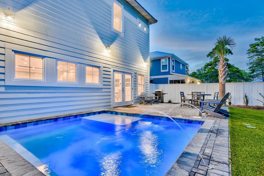 No detail or upgrade has been overlooked in this just completed, fully furnished, 3 story luxury beach home with private heated pool in Frangista Beach! Rentals are projected between $120k and $132k a year. Features of this 7 bedroom/7.5 bath gem are numerous. 5 of the bedrooms are master king suites with private en-suites, the other 2 bedrooms are custom bunk rooms with built-in queen bunks with stairs. Every room includes private baths. The main level of the home features the massive living room, kitchen, dining, half bath, and the 1st master bedroom. The ultra luxury kitchen offers professional grade stainless steel appliances, gas range, hood vent with lighting, double size refrigerator, separate ice maker, and beverage fridge. The extra large dining area has a table to accommodate 17 adults. And the living room offers tons of space for family and friends as well as a sleeper sofa, as well as an 85" smart tv. The second level offers four more bedrooms, including 2 masters (one with private balcony) with doorless walk-in showers with tile from floor to ceiling as well as massive free-standing tubs. A secondary lounge/living space includes another sleeper sofa and 75" smart tv. Lastly the 2nd level features the two large bunk rooms. Onto the 3rd floor, two more full master bedrooms are offered. The large private paver back patio features a heated pool with jets, fountains, sun shelf and a bench, gas grill, as well as attractive synthetic turf. Other features of this home include tile floors throughout, tongue and groove white washed ceilings, impact glass doors and windows, 2 high efficiency washer and dryers, surround sound, custom cabinetry, 4 owner closets, LED lighting, 2 HVAC units with 3 smart thermostats, tankless water heater, and more. The Villas of Frangista Beach is an attractive gated community with deeded beach access as well as community pool and clubhouse. This professionally designed and furnished beach home offers everything you could ever want in a secondary home and investment property. Come take a look! Buyer to please verify all information contained herein.