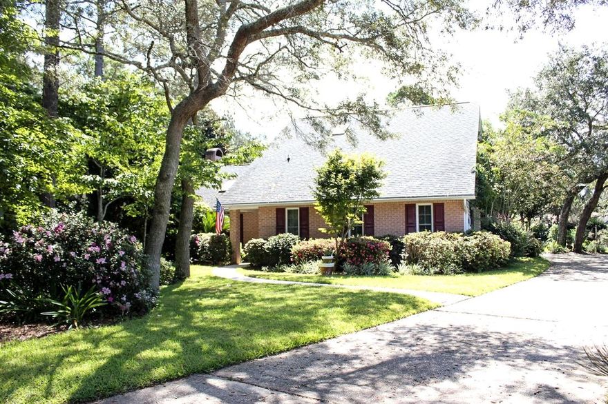 Looking for privacy and space to breathe...then come take a look at this gorgeous home! The moment you enter the home you immediately sense warmth and coziness. The living room and dining room offer plenty of windows to take in the natural light not to mention a view of the awesome pool. There are beautiful cherry hardwood floors in the foyer, living room, dining room, and hallway. Beautiful kitchen with granite and stainless appliances (including instant hot water and a warming drawer) make cooking a joy. The breakfast room has a lovely bay window and a great built in buffet. The master bedroom is also on the first floor and is spacious with cathedral ceilings and skylights. The master closet offers built in closet organizer to maximize more space.