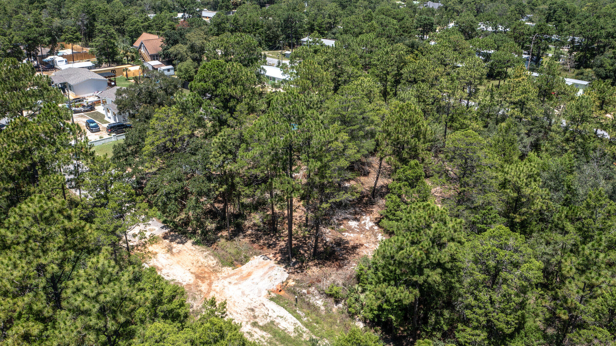This is a great opportunity to build your dream home in an area that is perfect to raise a family enjoying the quiet environment. NO outlet road, giving to it the privacy that you need, an area that is growing on developing multiple beautiful homes, your equity will multiply for sure!This lot is ready to be built on, dry and high, will be completely cleared, small driveway already in, flood Zone X and corner markers are close, only 5 mins from the beach.Perfect piece of land!
