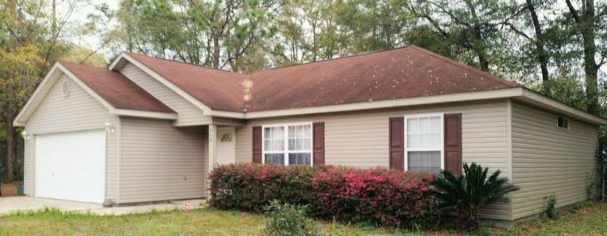 Cozy 3 bedroom 2 full bath home with split floor plan situated on a corner lot in North Crestview. Home is within walking distance to an elementary school and daycare.
It has a two car garage, laundry rm with hook-ups, central heat & air and brand new carpet throughout. The master bedroom has a trey ceiling with a private master bath with a soaker tub & shower combo and walk-in closet. There is a chain linked fenced back yard and basketball goal in front driveway. Call today to see this lovely home.