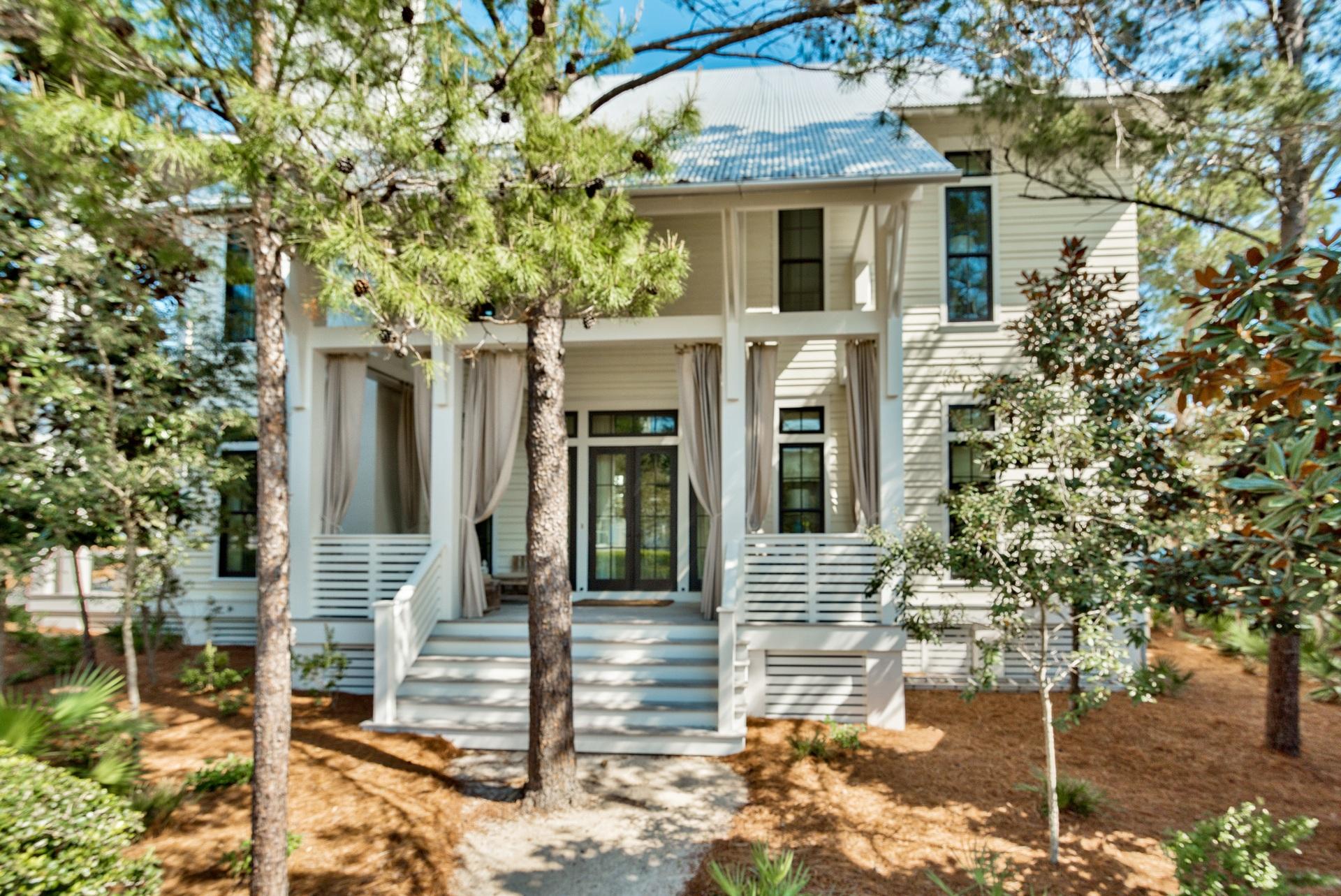 This one of a kind stunning home was design by Geoff Chick and built by Cole custom homes and is located on one of the largest corner lots in Phase III of Watercolor just across from the frog Pool. This home is accented with southern porches perfect to enjoy the peaceful and serene sunny Florida weather. As you enter this home you are greeted with immaculate attention to complete custom detail. The walls are Venetian plaster; with 12ft ceilings that are accented with exquisite solid antiqued oak beams, and antiqued oak floors. This one of a kind chefs kitchen has custom pecky cypress cabinets, beautiful leather counter tops, with all stainless steel top of the line appliances.