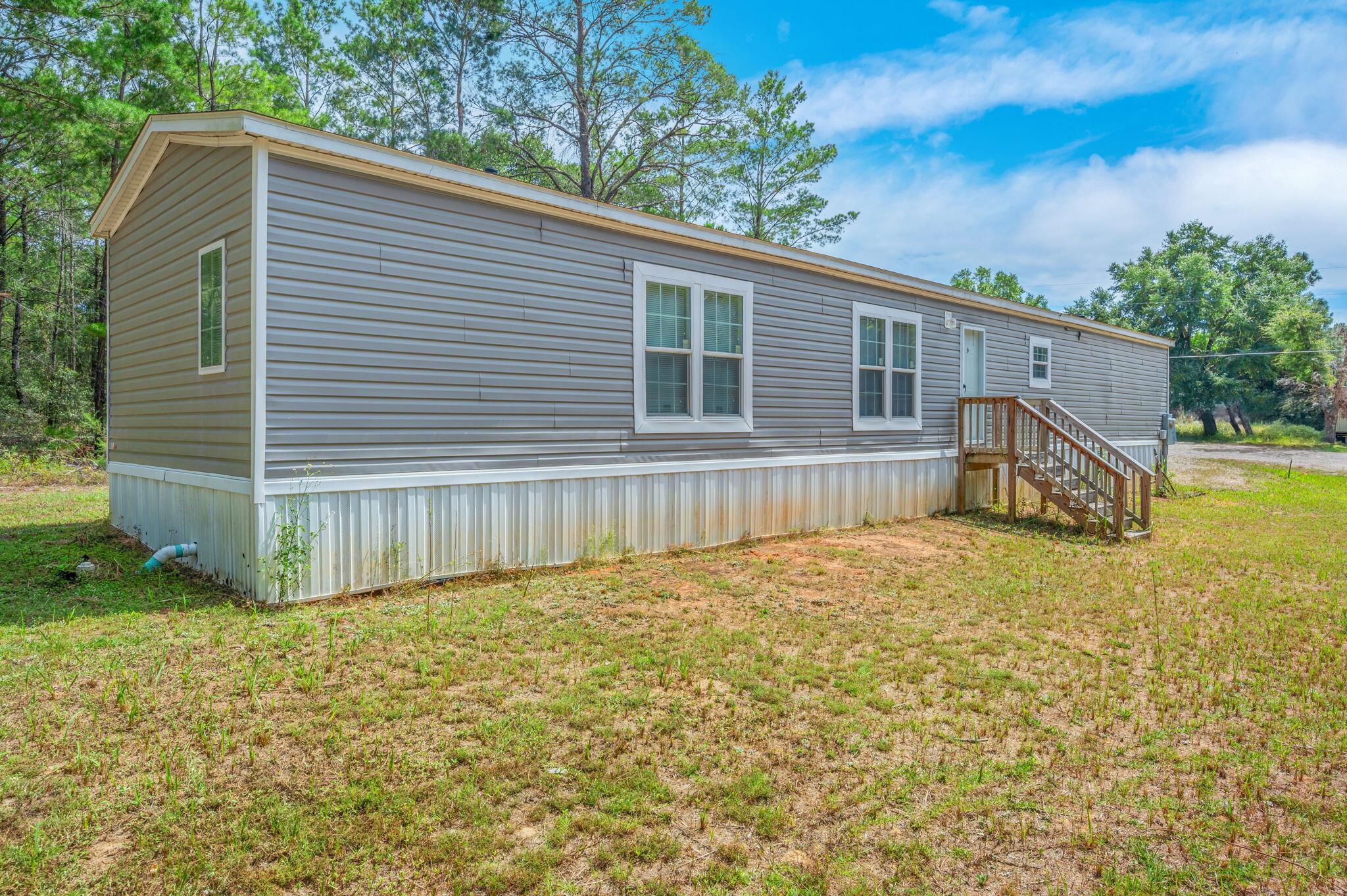 Beautiful 2 Bedroom, 2 Bath Mobile HomeThis spacious and well-maintained 2-bedroom, 2-bath mobile home offers comfort, style, and functionality in a thoughtfully designed split floor plan. Enjoy an open living area featuring a cozy fireplace--perfect for relaxing evenings--and a modern kitchen complete with a center island, ideal for cooking and entertaining.Each bedroom is generously sized, providing plenty of privacy and space. With two full bathrooms, convenience and comfort are at the heart of this home. Whether you're looking for a quiet retreat or a welcoming space to host guests, this home delivers.Don't miss out on this beautiful rental--schedule a showing today!