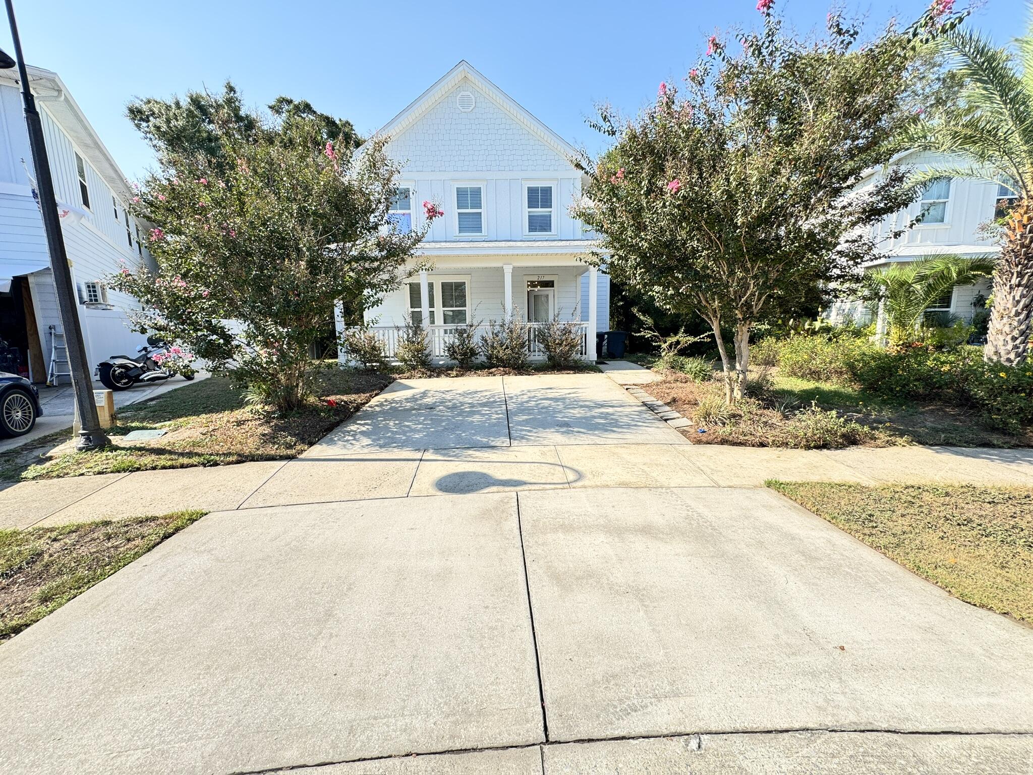 This well-maintained 4-bedroom, 2.5-bath home is nestled in the desirable Washington Point community, offering both space and convenience. Set on one of the largest lots in the neighborhood, the property features a peaceful creek along the back and sits quietly on a cul-de-sac. Step inside to a welcoming foyer that leads to bright living spaces with tile floors downstairs and durable LVP upstairs. The spacious master suite features a private bath and a generously sized walk-in closet. Outside, enjoy a screened back porch and an open back deck, perfect for entertaining or relaxing while taking in the natural surroundings. just a few miles from 30A, the Emerald Coast beaches, Publix, shopping centers, and a convenient boat launch. Popular destination Seaside, Seagrove, and Eden Gardens Stat
