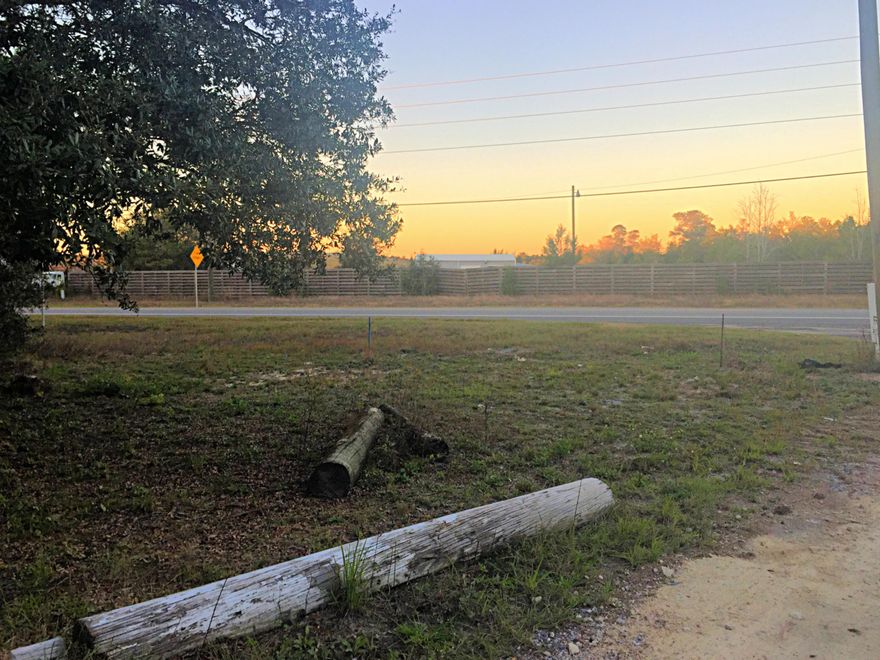 Great lot of land with 60 feet of HWY 20 road frontage. Mostly cleared lot. Two boat ramps within 2 miles of the property. Very easy access to property.