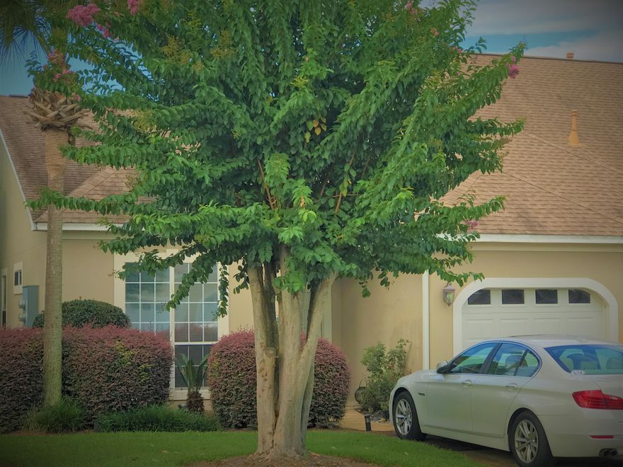 End unit three bedroom, two bath townhome on one floor in the private community of Bon Villas. This community features a pool, tennis courts, and bay access with a fishing pier. The unit includes a galley-style kitchen with pantry/laundry room. There is an open dining/living room with a cozy corner fireplace. Master is ensuite with double vanity and walk-in closet. French doors open to generous screened porch. Step outside to a lovely secluded secret garden space for relaxation, meditation. Unit has many upgrades, including a new HVAC, new 3 amp hurricane-rated garage door, new Samsung SS appliances, new custom cabinets, new upgraded lighting and ceiling fans. A home warranty allowance is included for buyer's peace of mind. Bon Villas is ideally located between Destin and