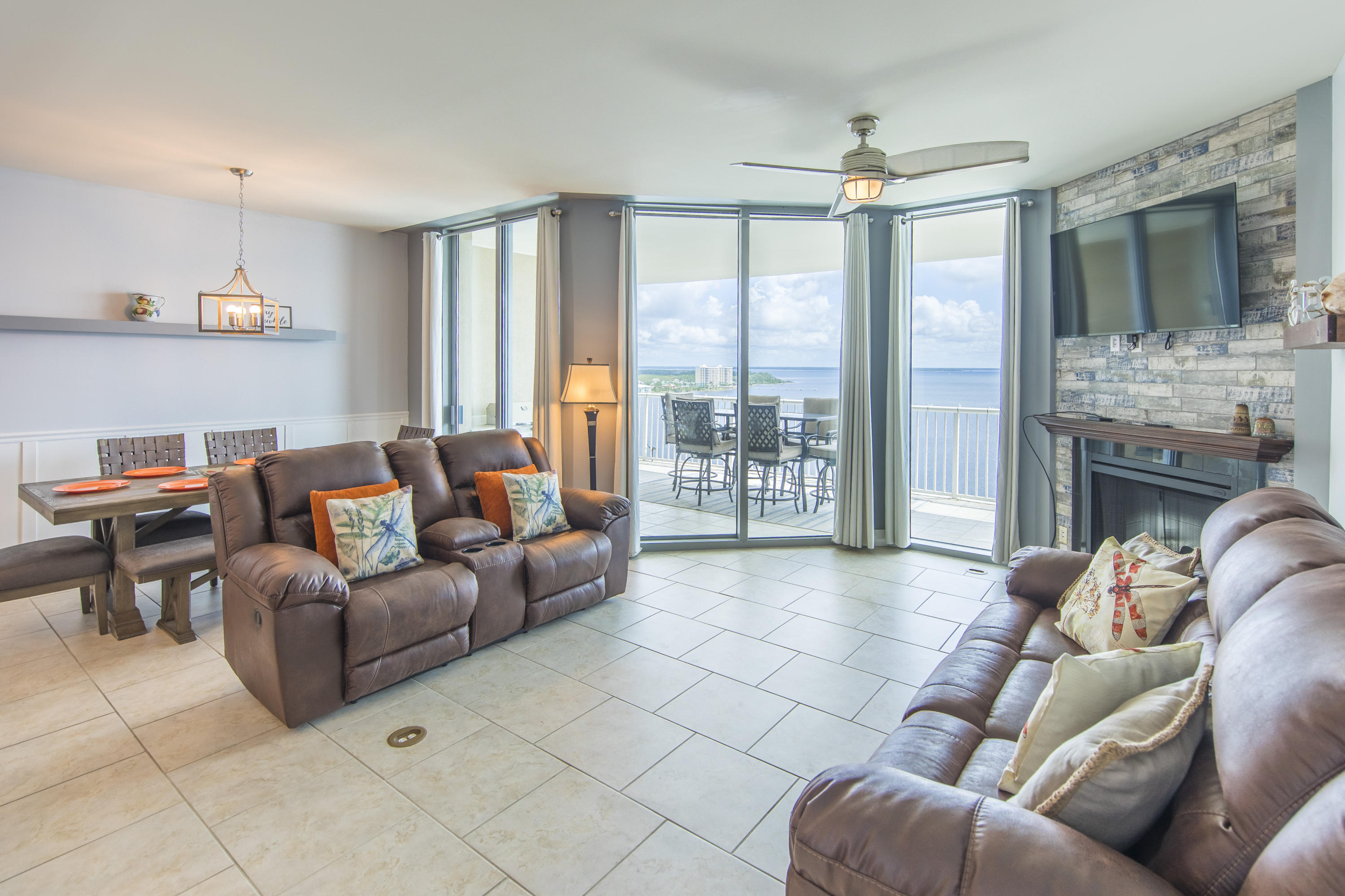 UNDER CONTRACT WITH CONTINGENCY, ACCEPTING BACKUP OFFERS.Spectacularly positioned Marina Landing condo with unencumbered views of St. Andrews Bay. This two (2) bedroom, two (2) bathroom condo has been upgraded to include all tile flooring in the main living areas, newer carpet in the bedrooms, custom brick on the fireplace, custom kitchen backsplash, shaker style kitchen cabinets including built-in pantry, stainless steel appliances, and updated modern fixtures. The owner took special care of this condo by updating all the window treatments and installing custom wall shelves for your special family / friends, or beach pictures. 2019 updates: New HVAC, hot water heater, all new ceiling fans, dining room freshly painted.