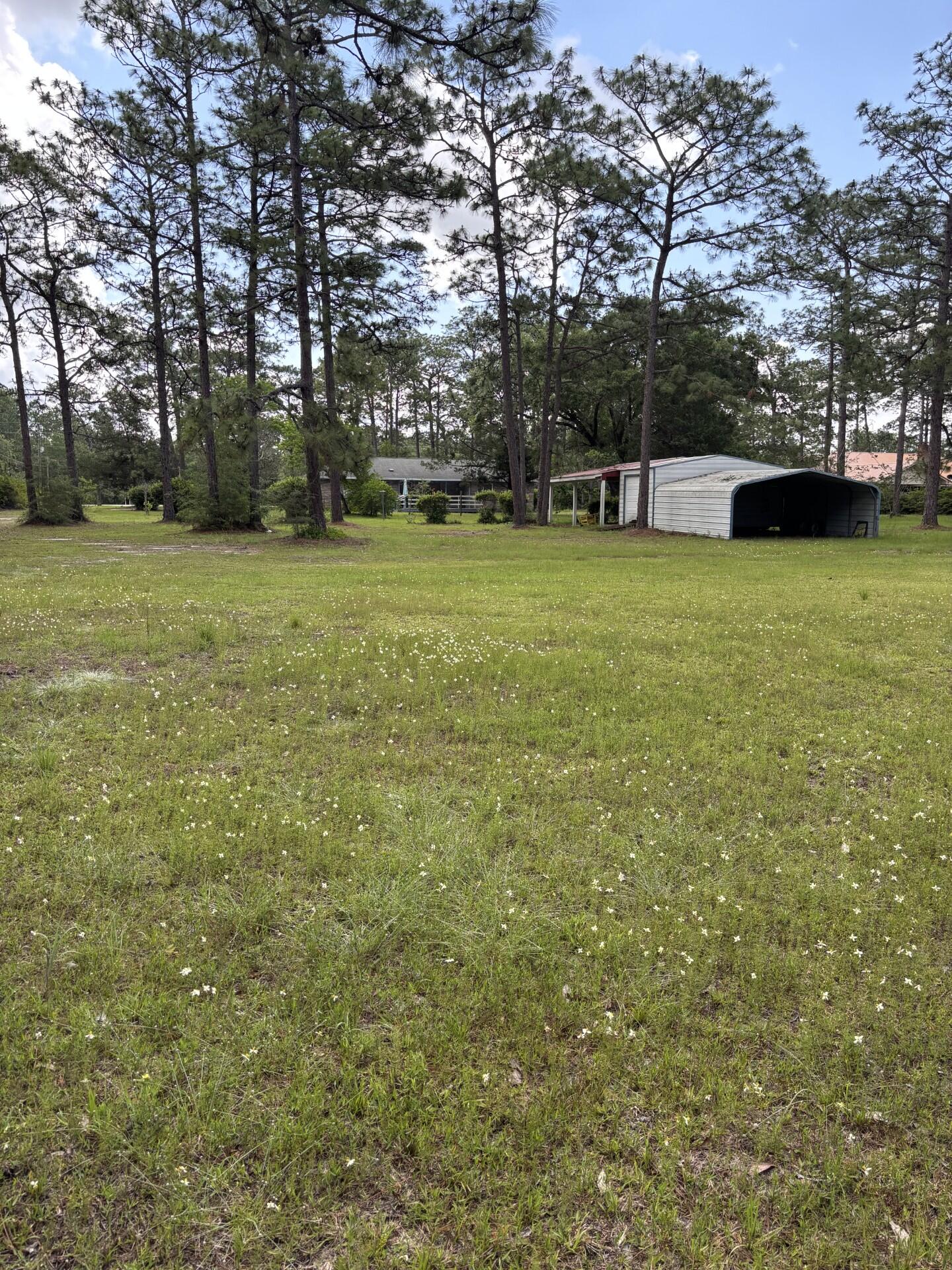 Located on Business Highway 331 in Freeport, Florida this property consists of 15+ acres with approximately 750 feet of highway frontage on Business Highway 331. Zoned R-3 High Density Residential plus a flood zone rating of X will accommodate up to several units per acre for future development as per City of Freeport land use guidelines. City water, city sewer. and power are available. Three schools, Freeport Elementary, Freeport Middle School and Freeport High School are located within 2 miles of this property. New middle school is being built in Hammock Bay is less than 4 miles away. This property includes a 2500 square foot custom built home and two large sheds for vehicles, boats or equipment. This unique property is located just 20 minutes from the Beaches of South Walton, 30 minutes from Eglin Air Force Base and only 15 minutes from Interstate 10 and DeFuniak Springs, Florida. Freeport Industrial Park with multiple businesses ais located approximately 1/2 mile from this property. There are multiple parks and boat launch facilities for recreational pleasure within minutes of this location.