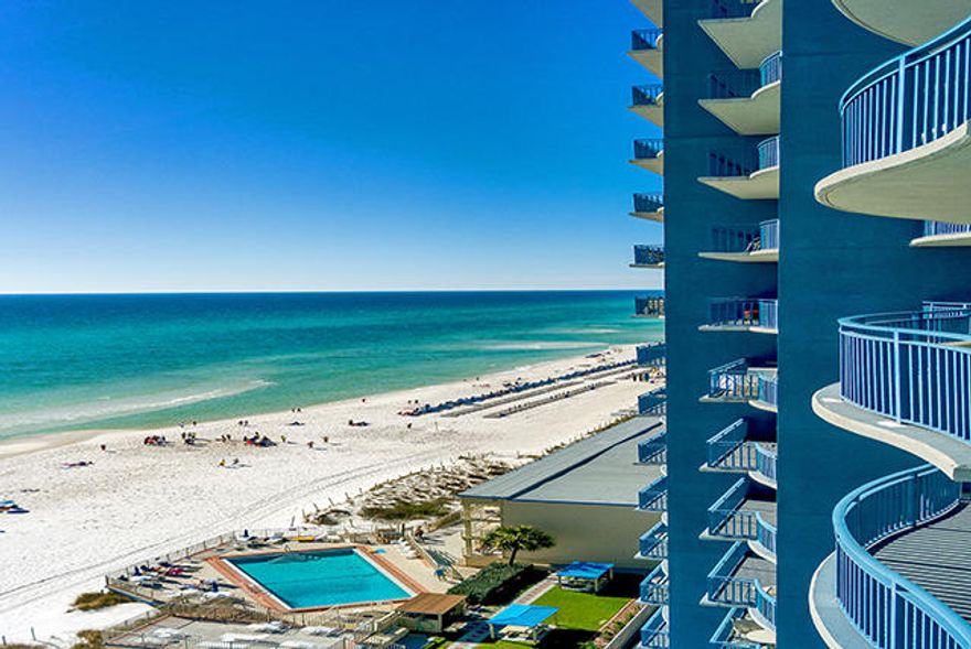 This 12th floor 1 bedroom plus bunk unit is nicely furnished and is one of the few complexes with grills on every balcony so you can cook while overlooking the Gulf. The complex has multiple levels of covered garage parking on the North side of Front Beach Road and a walkover for easy access. The ground floor has a Heated 0 Entry Pool, Spa and Concession area with wine & drinks. There is also a fitness center and direct access to the beach. Ideally located just minutes from the area's dining attractions, Pier Park shopping area, the international airport. Measurements are approximate, verify if important.