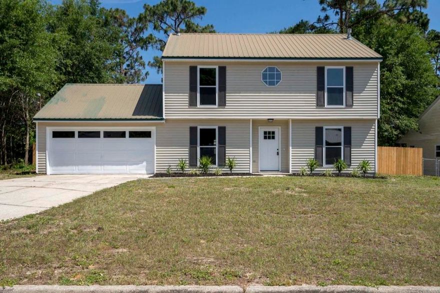 Welcome home to this beautifully renovated 2 story home in a great location in south Crestview, south of I-10! Updated open kitchen, cozy gas fireplace, screened-in porch overlooking large flat fenced in backyard! Lots of space in large walk-in closet in master bedroom upstairs. Featuring brand new windows and new flooring throughout! Come check it out today!