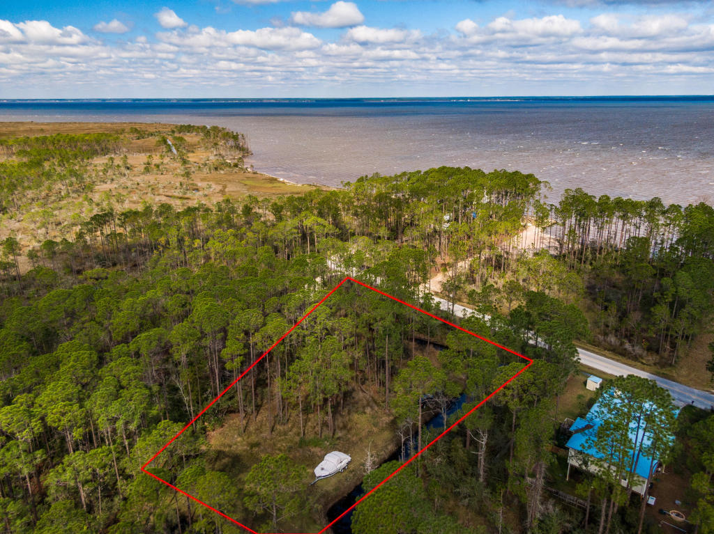 Prime location in South Walton with possible Bay Views! This spacious lot is .59 of an acre, offering plenty of room to build a new home with large garage, carriage house and/or pool. The location is very desirable, tucking you away in small private community, while still being only minutes from the beach and all of 30a fine amenities. If you enjoy canoeing or dream of one day owning a boat, Hogtown Bayou public boat launch is conveniently located just around the corner. This lot is truly one of a kind and is a mist see at this price! No HOA fees. Survey and Elevation Certificate is available upon request.