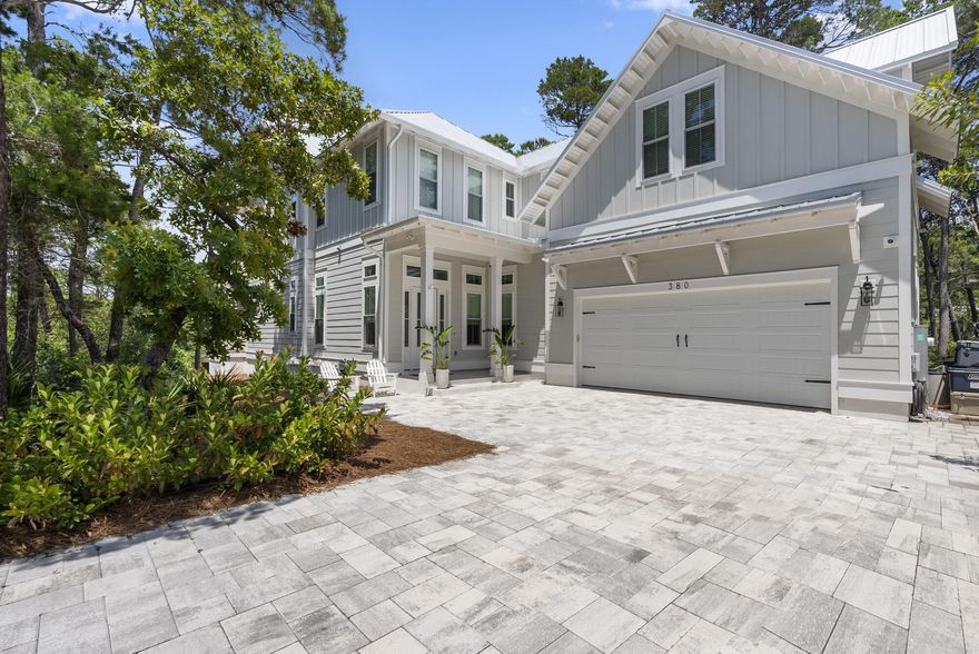 Welcome to 380 N Wall Street, a stunning canal-front residence nestled in the Preserve at Inlet Beach. This custom built home, boasting 3,890 square feet of meticulously designed living space, offers an unparalleled blend of elegance and comfort, perfect for those seeking a serene yet sophisticated lifestyle.Upon entering, you are greeted by soaring 12-foot ceilings and an open floor plan that seamlessly integrates indoor and outdoor living. Engineered hardwood floors extend throughout the home, enhancing its warm and inviting ambiance. The expansive back porch provides breathtaking views of the canal leading to Lake Powell, ideal for both relaxation and entertaining. The chef's kitchen is a masterpiece of design and functionality, equipped with high-end finishes and appliances that cater to culinary enthusiasts. Adjacent to the kitchen, a wet bar offers additional space for all your bartending needs. The home's large rooms, flex space, and separate office, provide versatility, accommodating various lifestyle needs for every member of the family.

The property features four spacious bedrooms and three and a half bathrooms, each designed to optimize comfort and privacy. The primary suite offers serene views of the natural surroundings, providing a peaceful retreat perfect for winding down after an activity-filled day. Storm windows and doors ensure safety and energy efficiency, while a state-of-the-art security system and safe room offer peace of mind.

Located behind 30 Avenue, just minutes from 30A, and a mere 10-minute drive to the beach, this home is perfectly positioned for enjoying the vibrant local lifestyle. It is conveniently close to an array of restaurants and shops, making everyday living both enjoyable and convenient.

Outdoor enthusiasts will appreciate the ample space to entertain, including the potential to build a private dock to access the canal for paddle boarding, kayaking, or fishing. The property's private lot ensures tranquility, all while being minutes to urban convenience.

This professionally designed home comes fully furnished, with decor that complements its luxurious aesthetic. Every detail has been thoughtfully curated to enhance the living experience, making it a turnkey opportunity for discerning buyers.

380 N Wall Street is more than just a home; it is a lifestyle. With expansive canal views and a location that offers both privacy and accessibility, this property represents a rare opportunity to own a piece of paradise in Inlet Beach. Don't miss the chance to make this exquisite residence your own. Contact us today to schedule a private viewing and experience the unmatched charm and elegance of this remarkable home.