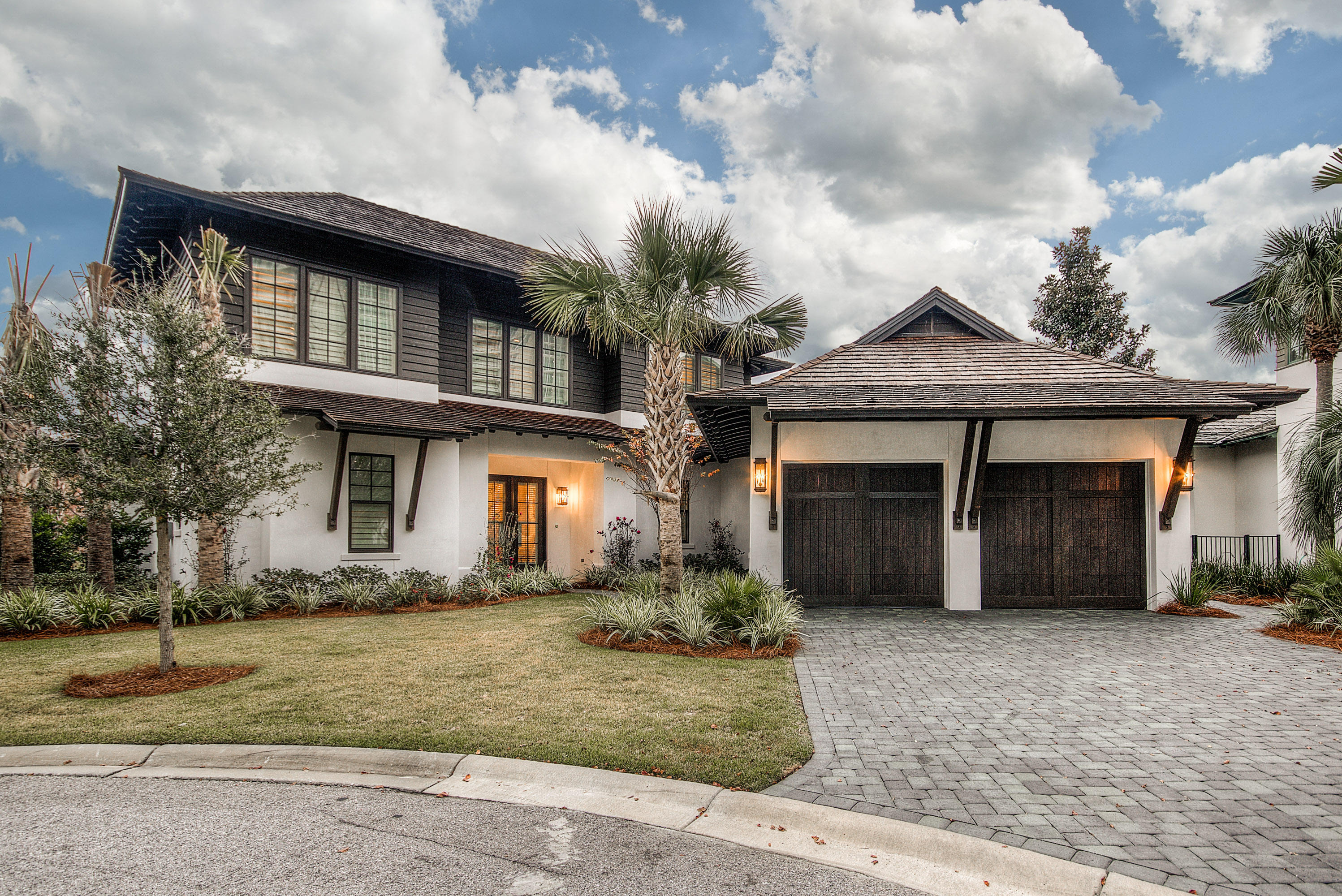 RARE OPPORTUNITY TO OWN A BEACH HOME IN SANDESTIN !!! ISLAND ESTATES is a GATED BEACH ENCLAVE of 9 homes on a lake on the Beachside of the Sandestin Resort, just a short walk to the beach. This West Indies style home will have an OPEN CONCEPT FLOOR PLAN with 4 Bedrooms 4.5 baths, large back porch, and an oversized 2 car garage PLUS GOLF CART GARAGE. HARDWOOD FLOORS THRU OUT THE HOUSE. LIVING ROOM HAS 12 FT. CEILINGS WITH WHITE WASHED BEAMS. Private Master Suite with spa like bath and 2 large walk in closets is located on the First Floor along with a 2nd Bedroom and bath. Upstairs has 2 bedrooms 2 baths and a 2nd Living Area. GOURMET KITCHEN WITH WALK IN PANTRY. THIS HOME ALSO FEATURES THE LATEST TECHNOLOGY UPGRADES ''CONTROL 4''. CALL TODAY TO SEE THIS AWESOME HOME !