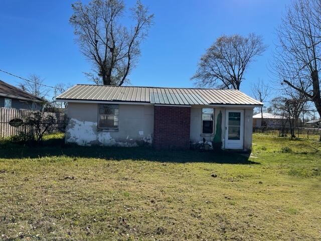 Great opportunity in a great neighborhood. Check out this 1 bedroom, 1 bathroom block home just north of Bay Haven Charter School and right outside of Camryn's Crossing. Exterior features a large, level fenced-in yard, and metal roof. Interior needs some updates and freshing up. Perfect for a first-time home buyer or for rental income.