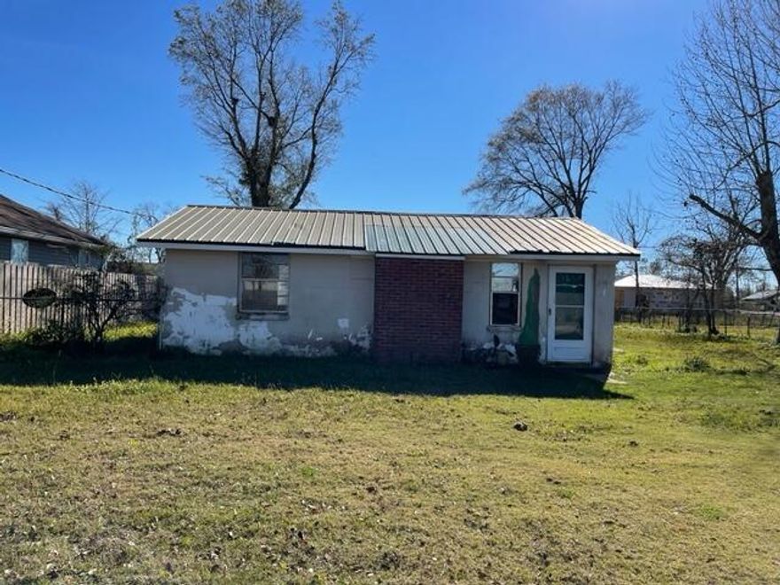Great opportunity in a great neighborhood.  Check out this 1 bedroom, 1 bathroom block home just north of Bay Haven Charter School and right outside of Camryn's Crossing.  Exterior features a large, level fenced-in yard, and metal roof.  Interior needs some updates and freshing up. Perfect for a first-time home buyer or for rental income.