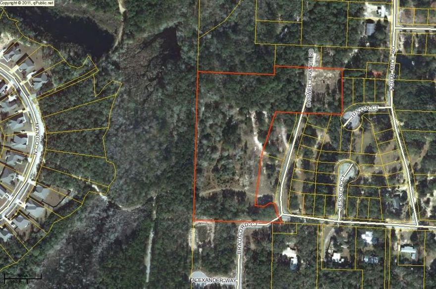 What a rare find for affordable acreage in city limits of Freeport. This 6.72 acres backs up to Hammock Bay, which has nature trails running through and just behind the back end of this property. This would be a great opportunity for developer, investor or just a homeowner looking for a great place to build their dream home. City water and sewer available and tap fees paid! There are actually 4 water meters currently on the property. Public sewer and electric also already on the property. There is also a capped deep well on the property currently not in use but can be used for potable water or irrigation. Horses allowed! Survey completed June, 2013. Storage sheds do not convey with property & will be removed prior to close. Don't let this one slip by!