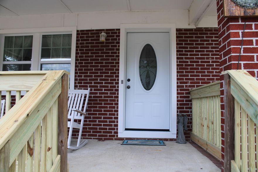 You don't want to miss this beautiful home. Inside has been redone. Copper wire, laminate plank flooring NEW in bedrooms. New windows on the front of home, crown molding in most rooms. French doors in the 4th bedroom that could also be an office (currently being used as office), with built in hand made desk. French doors in dining area out to back deck area. Sun porch and sun deck 30x8, in the front of house to enjoy the serenity. There are 2 free standing sheds one is 9x12 the other is 8x16 and has electric, cable hookup and 2 lofts! Swings out back for the kids or the kid in you. Split bedroom plan. Lots of love and care in this home. Buyer to verify any and all information deemed important to them