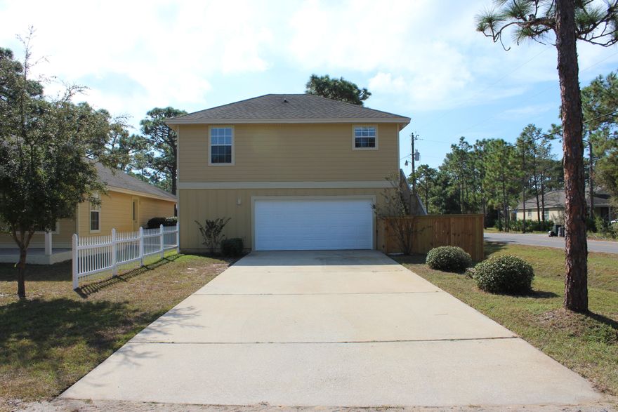 Quaint upstairs apartment available for yearly lease. The  apartment features an open living area and kitchen with tile and  wood vinyl flooring. This price include the upstairs apartment with 2 car garage. The backyard is fully fenced. Owner will consider pet less than 25 lbs. with pet fee.