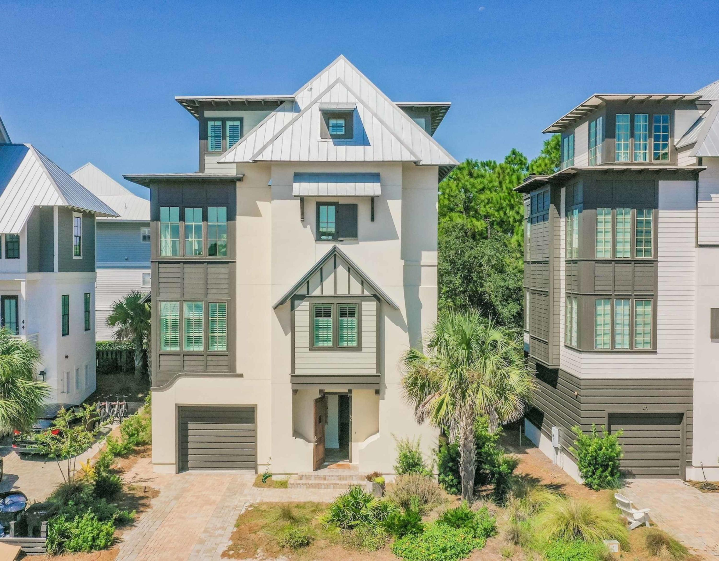 This generously appointed and well-decorated 5 brm/4.5 bath beach home is located south of 30A in the quaint community of Tresca Place in Seagrove Beach. You're just steps away from the community pool and a short walk from the beautiful Gulf of Mexico beaches. This area of Seagrove allows for quiet enjoyment and relaxation at the beach, as well as close proximity to the dining and entertainment of Rosemary Beach and Seaside. Built in 2015, the home features hardwood floors throughout, SONOS home sound system, an elevator that travels to all floors, and gorgeous modern finishes. The home is professionally decorated with coastal inspired decor and furnishings. Relax in the open concept living/dining area on the third floor with over-sized windows looking at the surrounding community