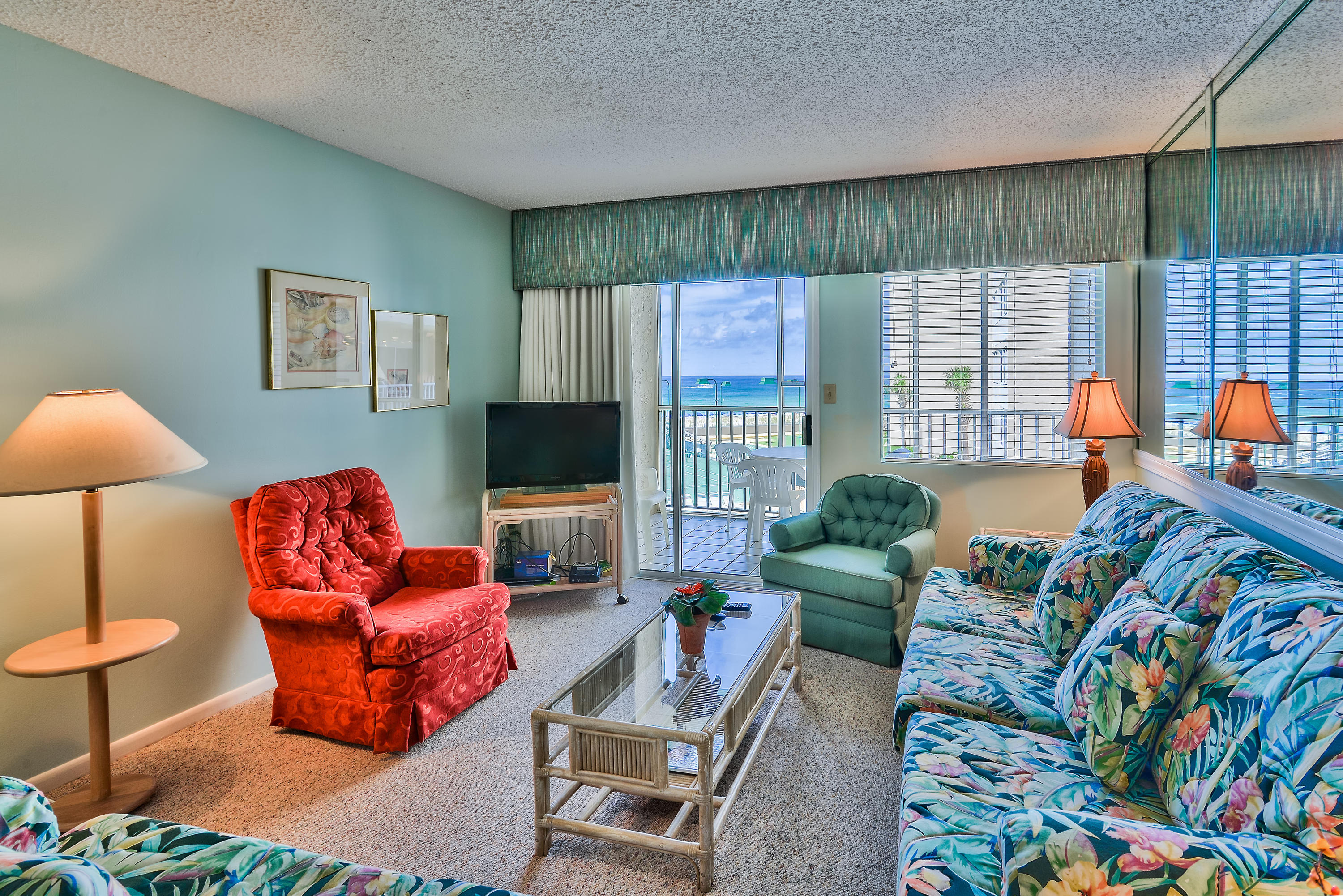 Come check out this great 3rd floor 2 bedroom unit located directly on the beach. This unit is close to the elevator and stairs for ease of access! Holiday Surf is a low density building sitting on about 5 acres of beautiful property. The beach condo has been well kept and is super clean. It over looks the pool, tennis courts, and gulf.