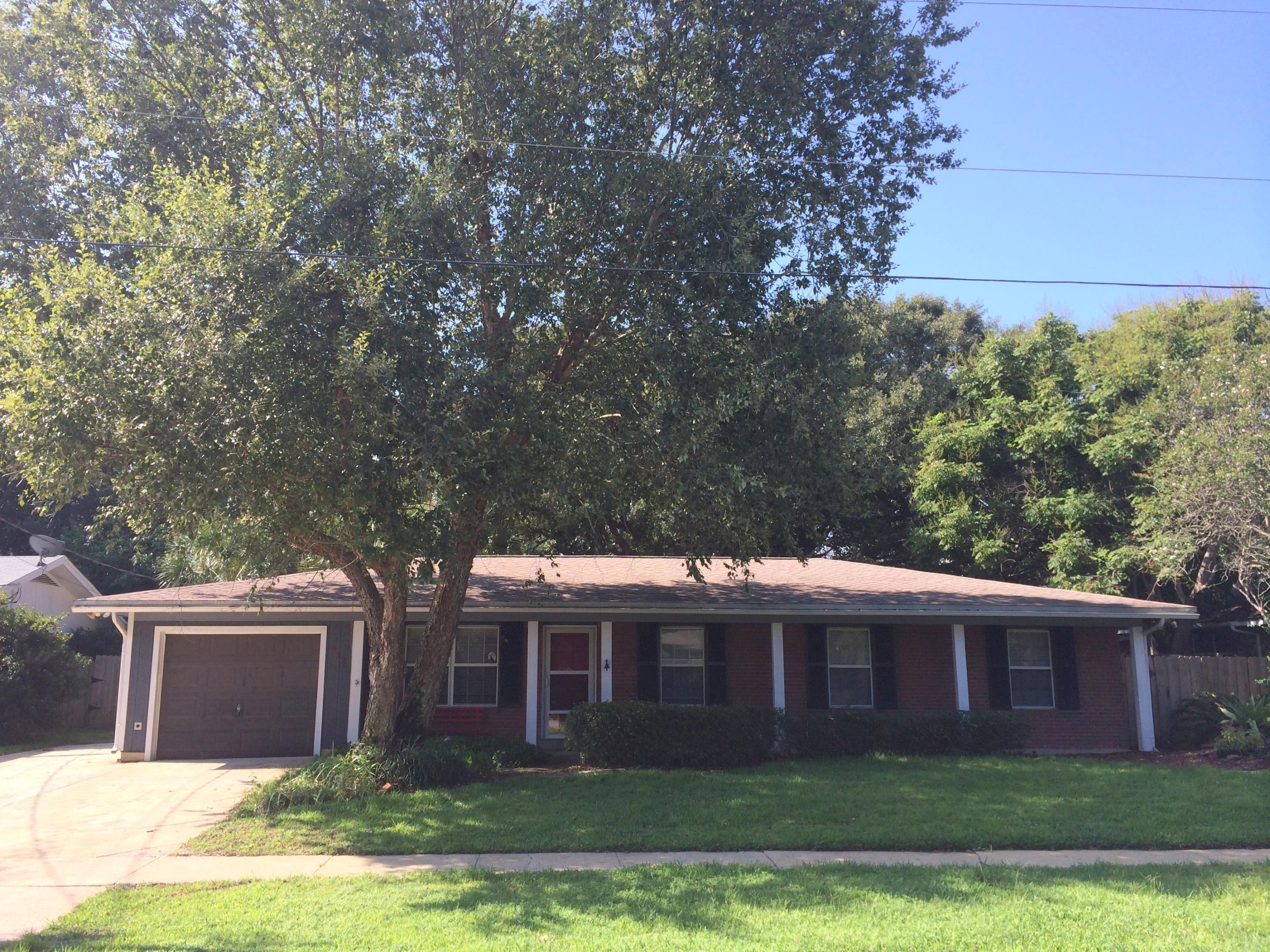 Charming ALL brick home, recently renovated in West Destin with open floor plan and large fenced in back yard. Renovated kitchen with new cabinets, upgraded lighting and granite countertops. Travertine floors throughout living areas with brand new carpet (10 yr stain and fade warranty) in the bedrooms! Home has been rewired, replacing old aluminum wiring. HVAC replaced within the last five years with new unit and New Nutone Freon. New hot water heater 2013. New roof within the last five years.