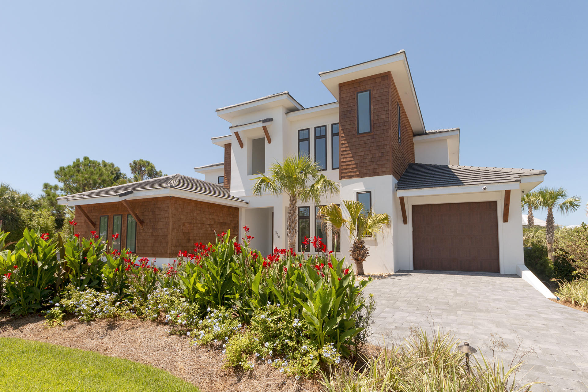 Unbelievably gorgeous 5BR/5.5BA, 5,087SF Canal Front home with one of the larges slips on Holiday Isle. This home spares no expense, from the 9'' plank hardwood floors to state-of-the-art smart home system with Lutron electric shades in all bedrooms, dining & front door, Visualint security digital camera system with DVR, lighting, pool automation & LED lighting. Entering the home, you are greeted by soaring ceiling and amazing views. The living room features a 2-story fireplace and 85'' Sony TV. The kitchen is a chef dream with Wolf/Sub Zero Appliances, quartz countertops and hidden pantry. Outside is a large outdoor living space with summer kitchen, large pool, boat slip with lift, jet ski lift, & plenty of room to entertain.