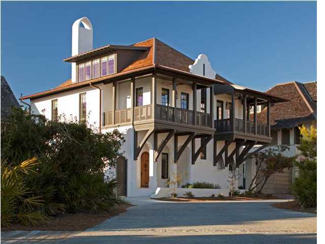 SUBLIME....tending to inspire awe because of elevated quality or transcendent excellence....describes the experience of entering this West Water Street residence located a stones throw from the GULF OF MEXICO. Meticulous attention to details by JONATHON HAMPEL and DARRELL RUSSELL of A BOHEME design is readily apparent. The juxtaposition of materials achieves the effect of delighting the senses. Velvety smooth VENETIAN PLASTER walls and ceilings are accented by rustic PECKY CYPRESS columns and beams where delicate pendants of ITALIAN SPUN GLASS are suspended. Exquisite CRYSTAL CHANDELIERS dangle from a bead board ceiling in the entry. The raw, ungrouted floors of Roman PATTERNED TRAVERTINE SLABS are met by sleek woven stainless steel backsplash in the kitchen. And what an amazing kitchen