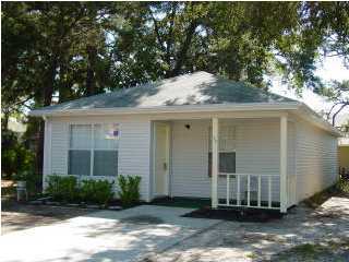 PERFECT STARTER OR INVESTMENT! An adorable front porch invites you into this two bedroom cottage which is close to everything, walking distance to Troy campus, short commute to Hurlburt or Eglin, close to shopping and beaches. Open floor plan with breakfast bar, inside utility room. Make appointment to see today SOLD ''AS IS''