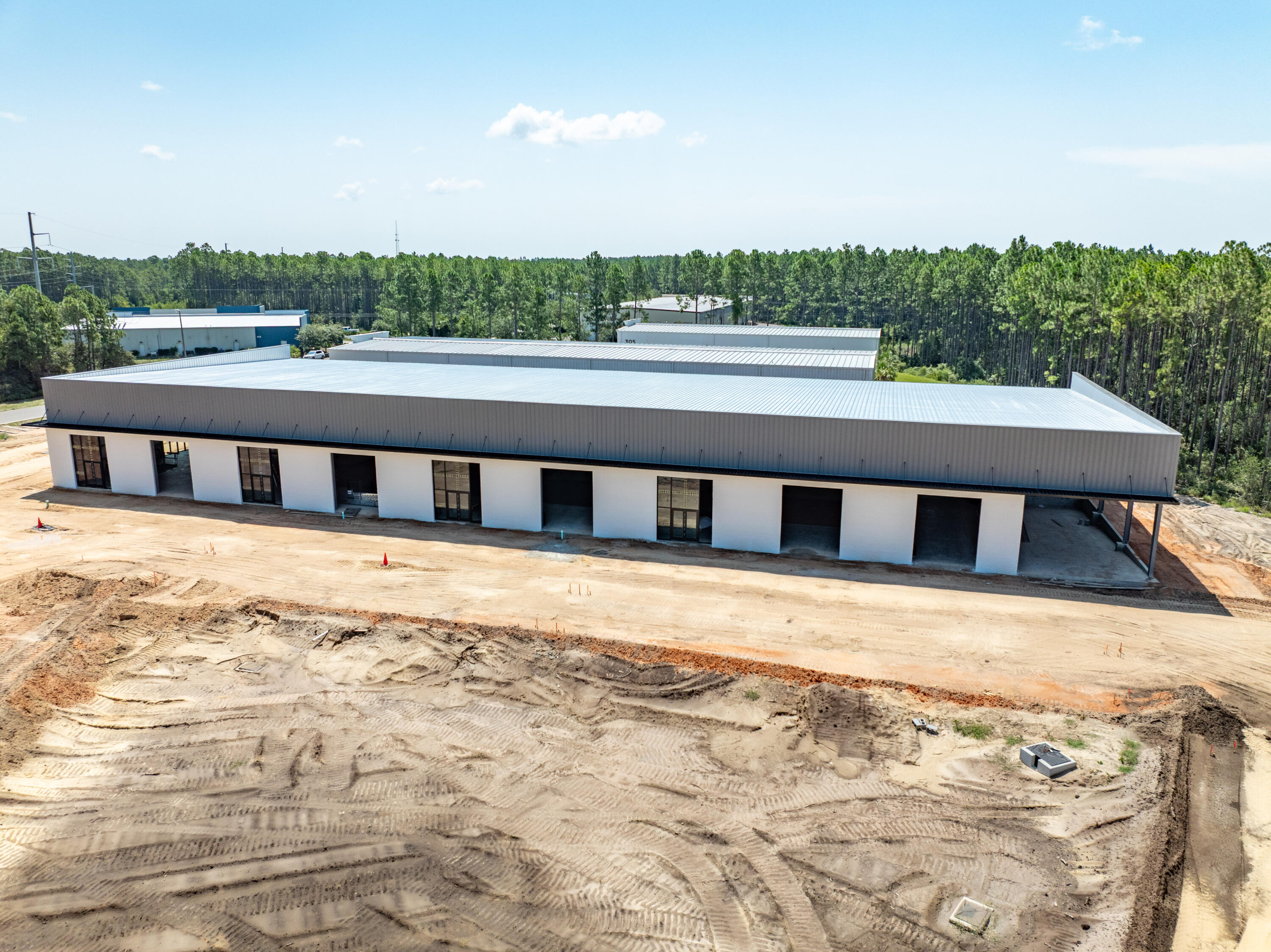 ~10,400 square feet of a total 25,430 square foot freestanding building with loading dock under construction in South Walton Commerce Park of the flourishing Santa Rosa Beach, Florida market! Please inquire for further details. The site plan is uploaded to this listing. This subject new development project involves Walton County, Florida parcels: 05-3S-18-16010-000-0050 AND 05-3S-18-16010-000-0060. Occupancy should be achievable by September 2025. Please inquire for further details.