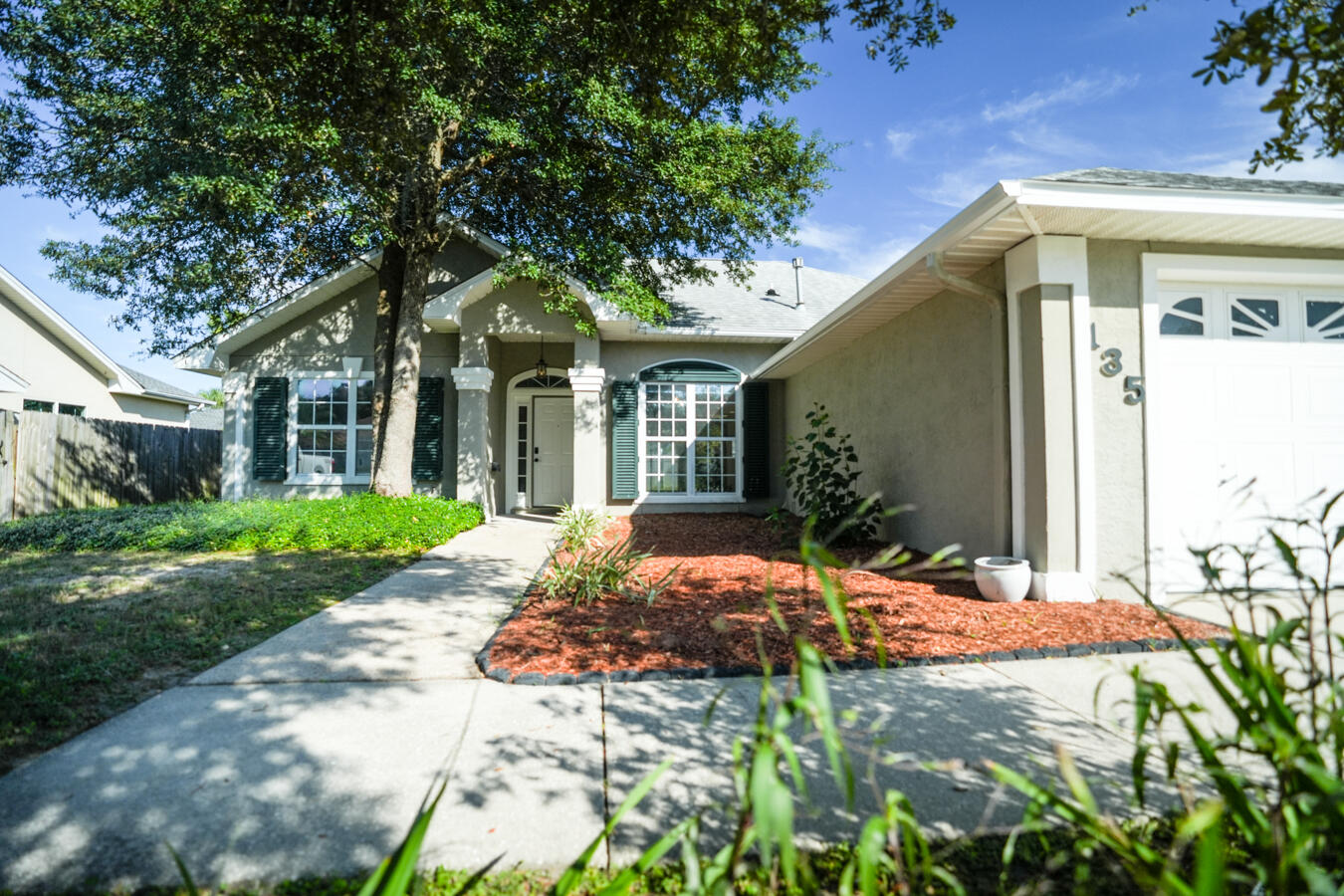 Welcome to Summer Breeze, one of the most desirable communities in Panama City Beach. This 3-bedroom, 2-bathroom home has been updated throughout and is freshly landscaped and pressure washed exterior, with fresh interior paint throughout. Step inside to discover an open floor plan with high ceilings, a custom kitchen, and updated bathrooms. The fenced-in backyard provides ample space for a pool. The second bathroom features brand new tile flooring. Nestled on a quiet cul-de-sac, this home is just 250 feet from Public Beach Access #66--perfect for quick beach trips! Enjoy the convenience of being 3-4 minutes from Pier Park and under 10 minutes from the iconic 30A. This golf cart-friendly neighborhood offers the coastal lifestyle you've been dreaming of.