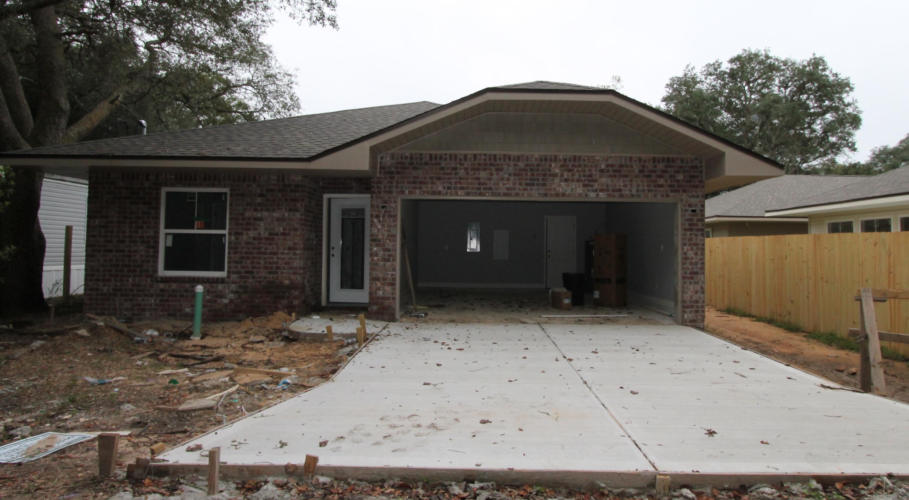 Contract fell through!!! Seller pays closing costs, first year of insurance, and pays to set up escrow accounts. Call for details. Brand new construction! Location, Location, Location! As You enter the foyer through the covered front porch, bedroom #1 and # 2 are on your left. As you continue down the hallway, you will enter the kitchen which will boast maple Cabinetry w/ crown moulding, 3 cm. granite countertops w/ bull nose edges, stainless appliances,(including a commercial grade refrigerator/ freezer), breakfast bar and pantry. The oversized great room is in the rear of the home, has a vaulted ceiling, and opens to a Large covered porch, which is perfect for entertaining. Tile flooring is throughout the main living and wet areas. The lighting package is upgraded and very tasteful. The master bath has a double vanity, whirlpool garden tub with a separate shower, a private water closet, and a linen closet. The indoor utility room is conveniently located at the rear of the kitchen and has built in shelving for added storage. This is one of 3 new home sites in this area. The yard comes beautifully landscaped and comes complete w/ a well, sprinkler system and timer. The yard boasts mature trees. Construction expected to be completed in February 2016.
