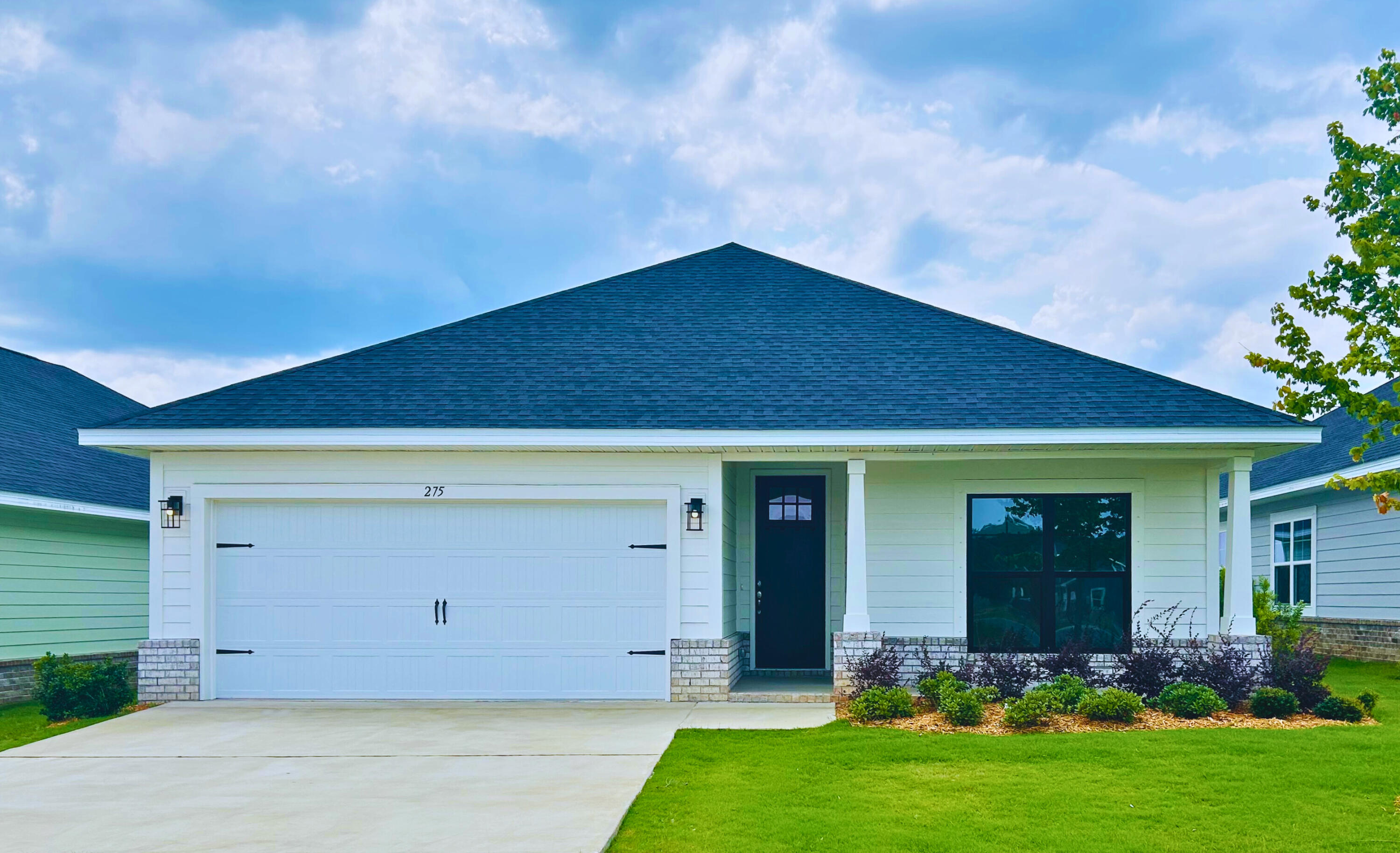 Limited- time offer: Receive up to $25,000 in Flex Cash! Use it towards options, interest rate buy-downs and any combination of HOA fees, prepaids or closing costs with our preferred lender. Open concept, large covered rear patio and large master bedroom help sell this plan. All ceilings at least 9', cathedral in main living area, tray ceiling in master bedroom, 8' entry doors. Located just 20 minutes to Blue Mountain Beach on the Gulf and 15 minutes to WalMart in DeFuniak Springs. Quartz countertops, durable CoreTec Pro Plus LVP flooring, fully sodded yard, sprinkler system with well and pump, garage door opener, pull-down attic stairs.