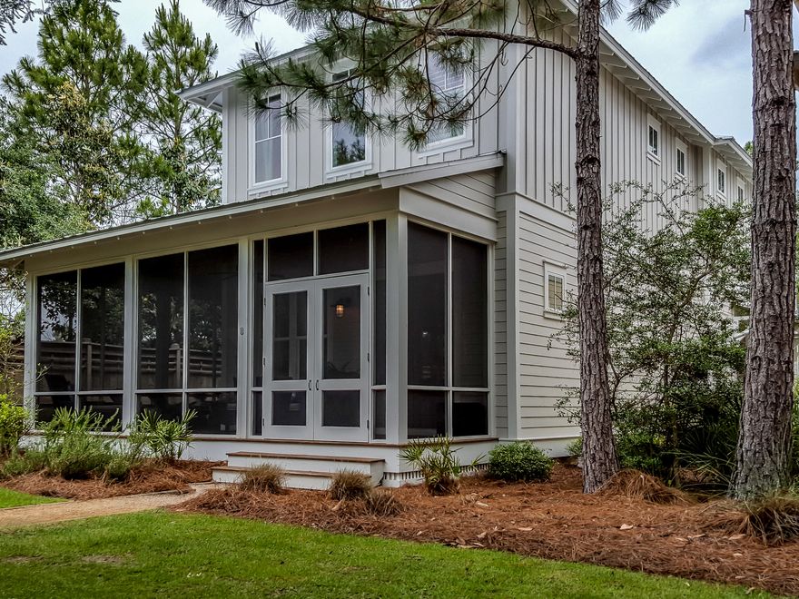 Exquisite WaterColor home for long-term rent in quiet location. High proximity to shopping and dining, yet still tucked away. Providing 2 Master Suites, 2 additional bedrooms (one with an ensuite bath), plus a bunkroom/office (5th Bdrm). You can live moments from the beach in a contemporary and charming row-house style home. Architecture boasts classic character with wainscoting and hardwood floors, while also offering contemporary elegance in light and airy beach tones. Comes with designer fixtures in hints of modern brass. Indoor and outdoor life harmonize with a full wraparound screened porch. 3 onsite parking spaces (over-sized), an added touch. Nearby parks, greens and trails. Grocery store and restaurants are out of site, but are only 500 ft away. This opportunity won't last long.