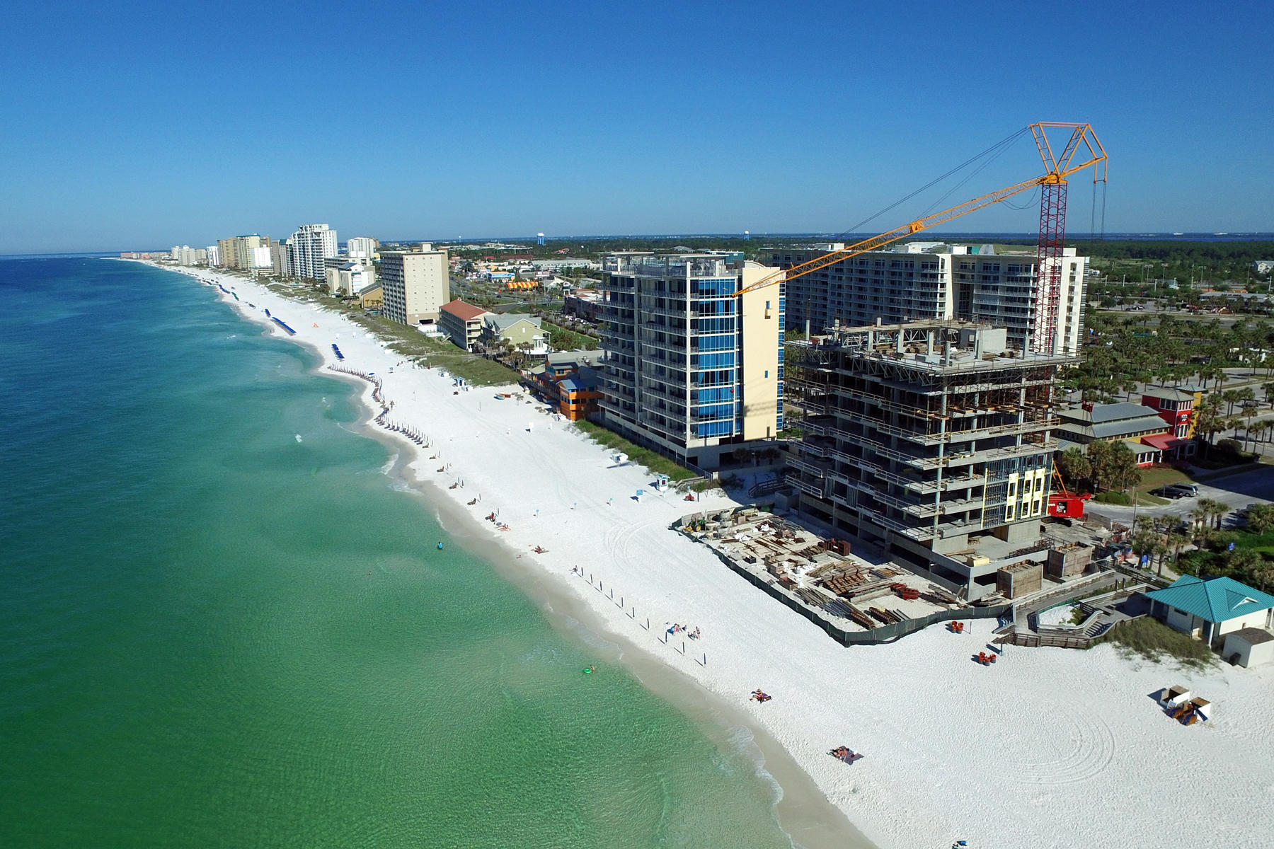 1900 Ninety Eight is Destin, Florida's first Gulf front condominium developed since 2007. This two story luxury penthouse features panoramic view of the Gulf of Mexico from its two story living room with an expansive wall of floor to ceiling windows as well as its two private balconies. The first floor balcony is equipped with an electric grill while the second floor balcony is enjoyed exclusively by the master bedroom. The open plan with clean, flowing lines invites beams of natural light inside. Special to the penthouse is a first floor media room. The penthouse features a private elevator inside the penthouse itself which allows for unparalleled access to each of its exquisitely designed rooms.