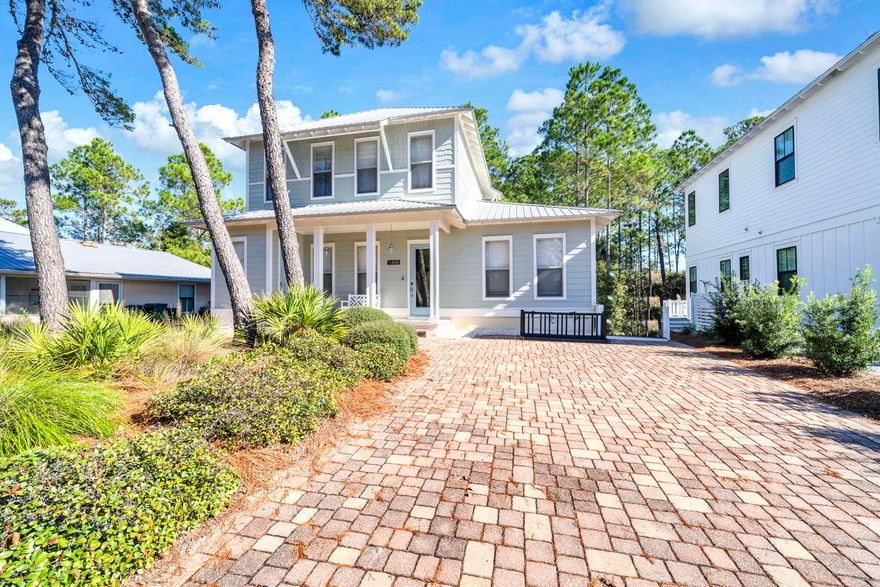 RENTAL READY & ROCKIN!! This adorable little cottage-style home is already well-stocked and set up for comfort and fun at the beach! With beach access a short walk away, pool access right behind the home, and a canal for sporting activities right across the street, the location is perfect for outdoor activities of all sorts. Inside, the living space is wide open and bright with tons of seating! The kitchen is set up for home cooking and has tons of storage with the added space attached. The first-floor primary bedroom is expansive and is attached to a luxurious stone bathroom with a water closet and a huge shower. Upstairs, there are two queens in one bedroom and a king in another. The cute bunk room has a twin-over-full bed. The upstairs bathroom is large and jack and jills with two of the rooms. Outside a beautiful deck was installed to allow for more private enjoyment of the Florida sunshine. Come see why this needs to be your next rental! 