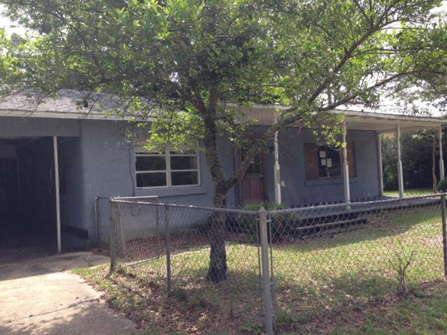 Handyman special in town and close to everything. This home is only a few blocks from Northwood Elementary and the revitalized downtown Crestview area and just a mile from Twin Hills Park. The home does need work however some renovations have already been completed. The kitchen has low-maintenance tile flooring and a newer vanity, toilet, and tub have been installed in the bathroom. The built-in bookcase in the bedroom is a nice touch. With some work this could be a smart investment at this price. The workshop is on a separate parcel and does not convey with the property.