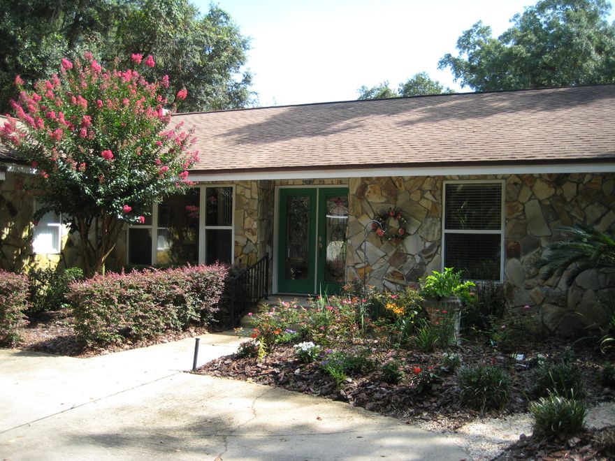 ***HOME WARRANTY INCLUDED*** Beautifully-maintained home in the desirable Robledal neighborhood! Enjoy the large in-ground pool, sit under the trees in the shaded backyard, or enjoy a book in the heated and cooled giant Florida room. You can choose where to relax in this peaceful setting. And a back up generator means you can relax without worrying about a power outage. Wonderfully landscaped property complete with mature vegetation, gorgeous crape myrtles, and so much more!