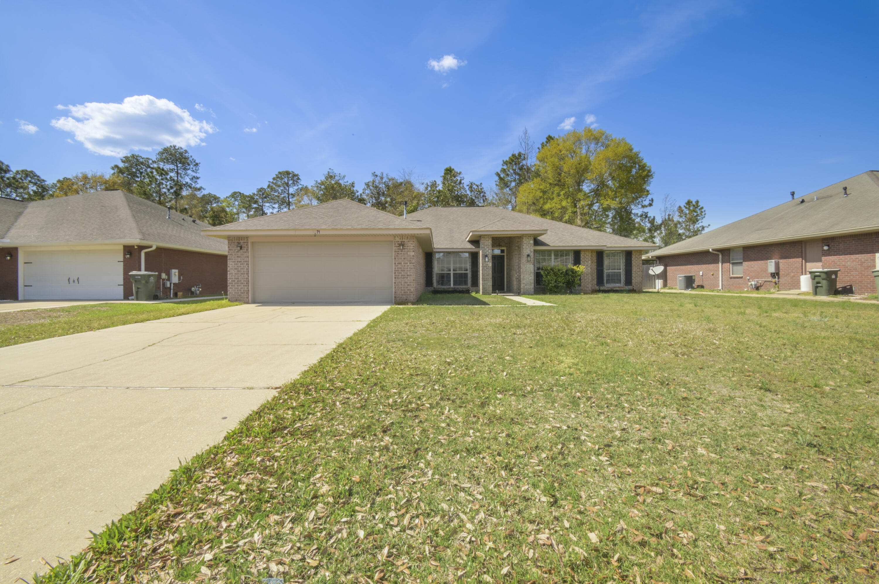 2.75% ASSUMABLE VA LOAN! This HUGE home comes with 4 beds PLUS AN OFFICE and is located in a charming neighborhood only 20 minutes from downtown Pensacola! Walking inside you will immediately notice the massive size of the house, with the vaulted ceiling in the central living space amplifying the size even more! To the right of the entrance you are greeted by a room that can be used as an office, and to the left the formal dining room. Heading forward into the living area, there is plenty of room for entertaining guests and a fireplace to cozy up to during our cold NW Florida winters. Designed for the family chef, the kitchen is equipped with seemingly unlimited counter space, tons of cabinetry, a pantry, and even a secondary dining area overlooking the backyard. The bedrooms are split on either side of the house, providing privacy for the massive master bedroom. The master can easily accomodate a California king bed with room to spare for all your additional furniture. Heading into the master bathroom is like walking into your own private spa. The en-suite is equipped with 2 walk-in closets, a private water closet, double vanity, a jetted soaking tub, and a separate shower. Each additional bedroom fits a queen bed, and share a bathroom in the hallway. This home includes a spacious laundry room with convenient cabinetry. Step out onto the patio with a cup of coffee and enjoy your fully fenced backyard which backs up onto a natural area - never to be developed. Stop by and make this house your future home! 2023 HVAC & new roof will be installed prior to closing!