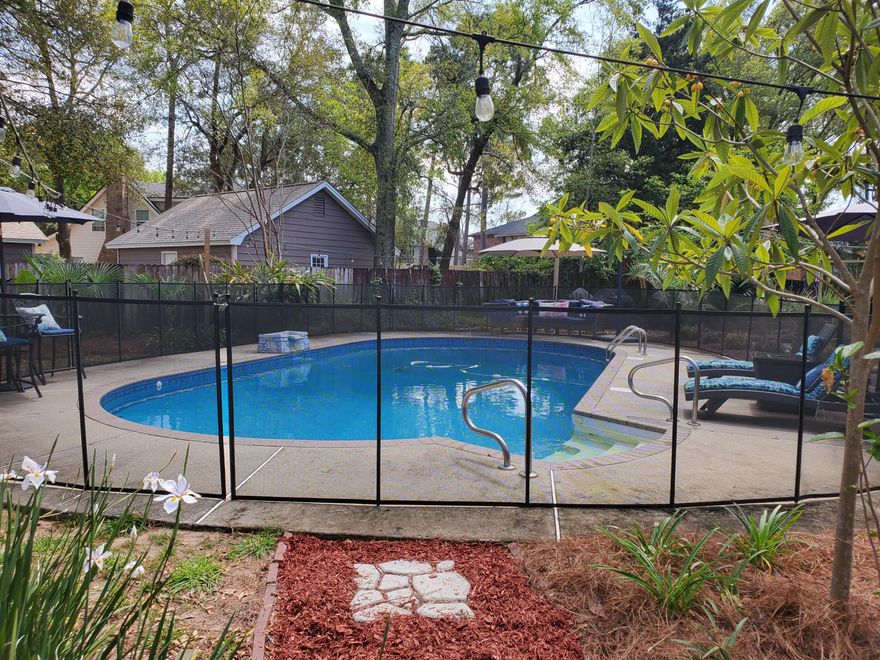 WOW!!!  This home has it all!!  Beautifully updated spacious home on a large lot situated at the end of a cul de sac with fully remodeled kitchen and bathrooms! NEW roof in Feb 2022, solar panels that will be paid off at closing, and a new pool liner March 2020! The wood look tiles will Wow you as they create a nice flow throughout the home.   Relax in the spacious family room as well as in the huge FL room that overlooks the beautifully lush backyard, sparkling saltwater pool, gazebo and outdoor kitchen/dining space with outdoor TV!  The large dining room has room for all and an additional bonus room off the kitchen is perfect for an office, kids play area, yoga studio..the possibilities are endless!  Enjoy peace of mind with a  safety fence around the pool in addition to the privacy fen fence along the perimeter of the property. The driveway allows for extended parking and a storage shed offers plenty of storage space for all your lawn and garden equipment.   This home has underground utilities and is on the same power grid as the Pensacola airport....so, if the airport ever loses power, rest assured that you too will enjoy being among the first in the area to have power returned after a major storm!  This home has been beautifully updated and maintained and is now just waiting for YOU!  Welcome Home to Paradise!!