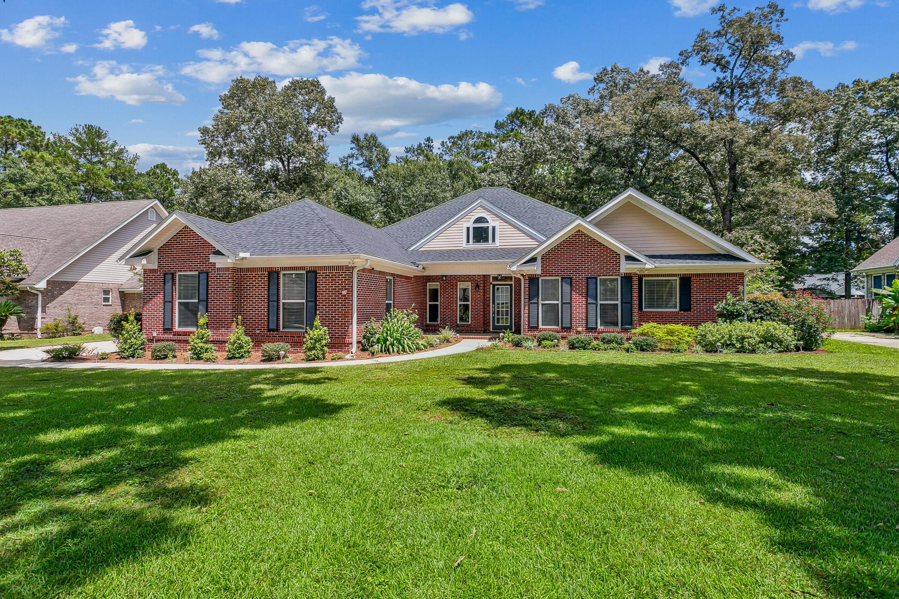 Enjoy the feel of quiet country living, without living in the country, in this freshly renovated home. This split floor plan is loaded with fine finishes from hardwood floors to ornate trim and fixtures. You'll love the open kitchen new stainless steel appliances but the real jewel of this house is the luxurious master bathroom. In the heart of this home is a large living room and family room adjacent to the kitchen and formal dining area. There is also an additional room just off the Jack and Jill bedrooms that would make a great playroom for the kids or an ideal office space. With an oversized 2 car garage and additional driveway space there is more than enough parking. Located in a very desirable neighborhood on flat 1/2 acre with lots of tree and no HOA! Bonus: Workshop with AC The sunroom/Florida room is heated and cooled.
