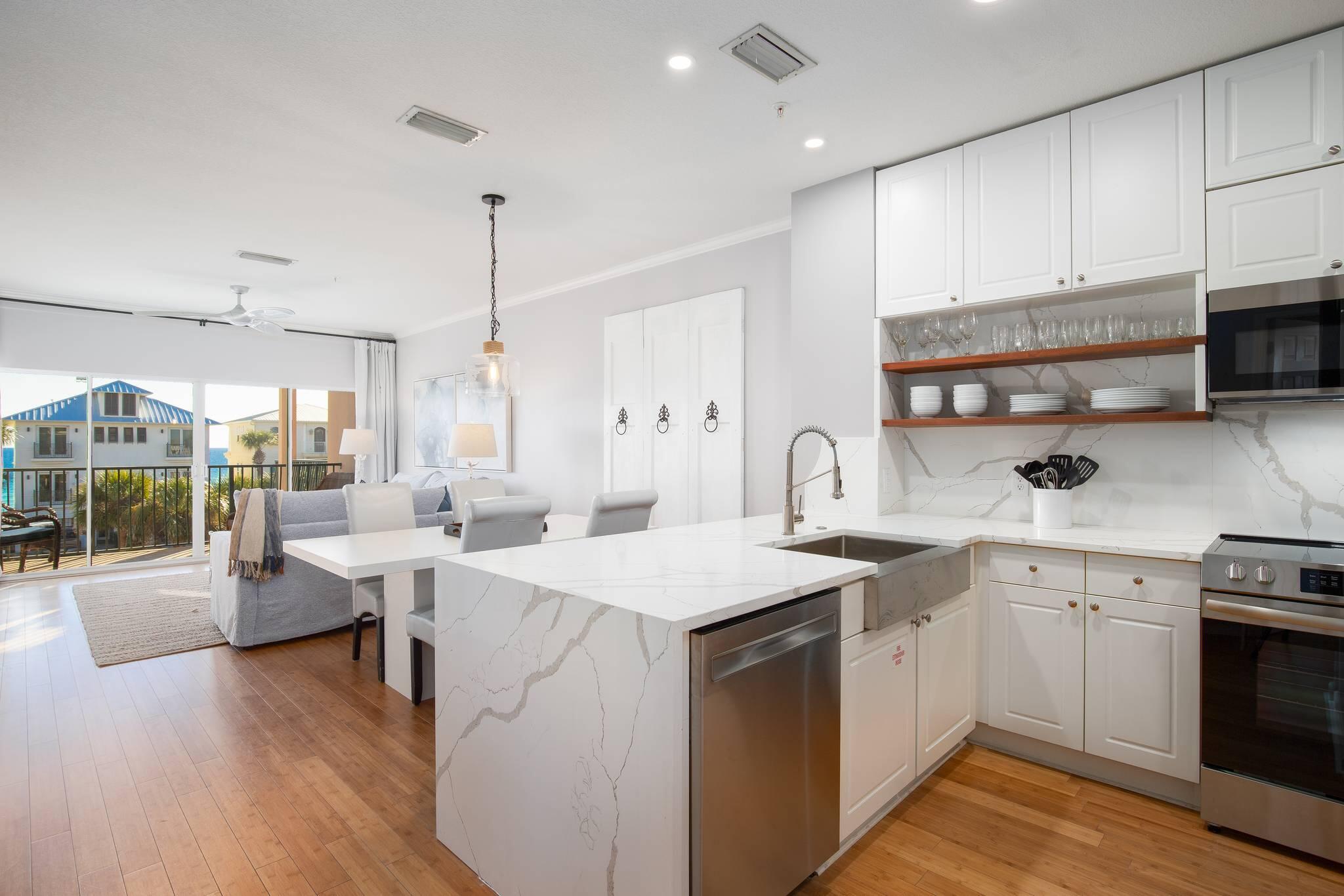 Price reduction of 10K for this remodeled dream vacation retreat: a stunning remodeled Gulf View Condo on Scenic 98! The newly furnished, turnkey rental located on the third floor of the charming Emerald Waters complex, boasts views of the Gulf and a delightful beach vibe. Just steps away from deeded beach access, you can spend sun-soaked days on the sandy shores before returning to your serene escape. Step inside and be greeted by a bright and spacious layout adorned with elegant waterfall countertops and stylish bamboo flooring. Large windows and a private balcony flood the space with natural light, creating the perfect ambiance for relaxation. Ideal for family getaways or fun trips with friends. The generous kitchen, featuring updated appliances and ample counter space, is perfect for crafting culinary delights. With the Gulf-facing master suite and remodeled bathroom facing the Gulf you found paradise. A new custom-built Stylish Queen over twin bunk room will make adults and families feel welcome and comfortable. This condo is a fantastic investment opportunity with gross income projections up to $58.5K. Nice full-size washer and dryer in laundry room. Don't miss out and schedule your visit today!
Video tour is available upon request.