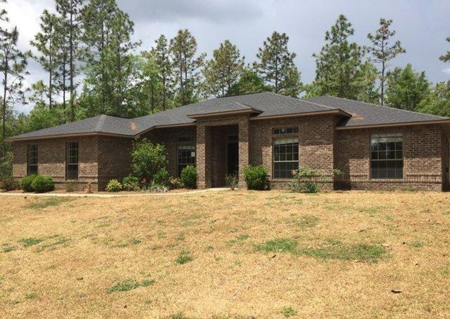 REO ~ Spacious all brick home on a large lot. This 4 bedroom / 2 bath home offers a large kitchen with island & granite counter tops; ceramic tile in the kitchen, baths & laundry room. All the bedrooms are spacious including the master suite with trey ceiling, double vanity in the bath & walk in closets. Don't miss out on this great home.