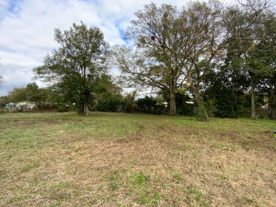 .1588  acre residential lot zoned HC/LI According to GIS map not in Flood Zone (X) , no wetlands, see photos for other pertinent information . ECUA has water, sanitation, and public sewer at lot. tap in fee is due. THERE ARE 3 LOTS side by side (mls # 991592 and # 991594) available and listed separate