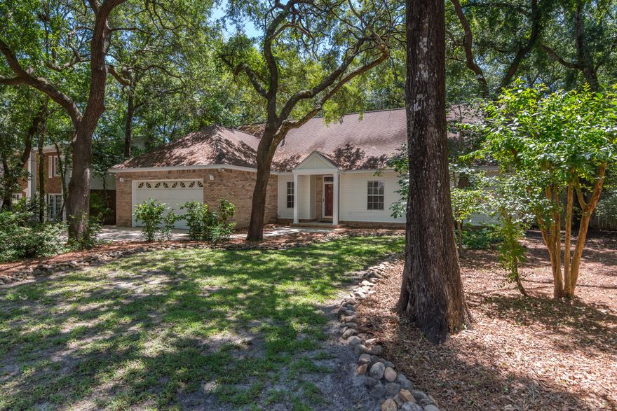 This spacious home is nestled in a private community of the Kenwood area with water access. All main areas of the downstairs feature wood flooring- No carpet downstairs except in the bedrooms! Separate living room and family room for all the space you need. Features such as crown molding, chair railing, recessed lighting, ceiling fans, additional outlets and more! Master bedroom, master bathroom, additional bedroom, full bath, and half bath are all located downstairs. Upstairs features two large bedrooms, full bathroom and loft area- all with wood flooring except bathroom. The kitchen boasts stainless steel appliances, breakfast bar and white cabinetry. The backyard is fully fenced and enormous! A must see