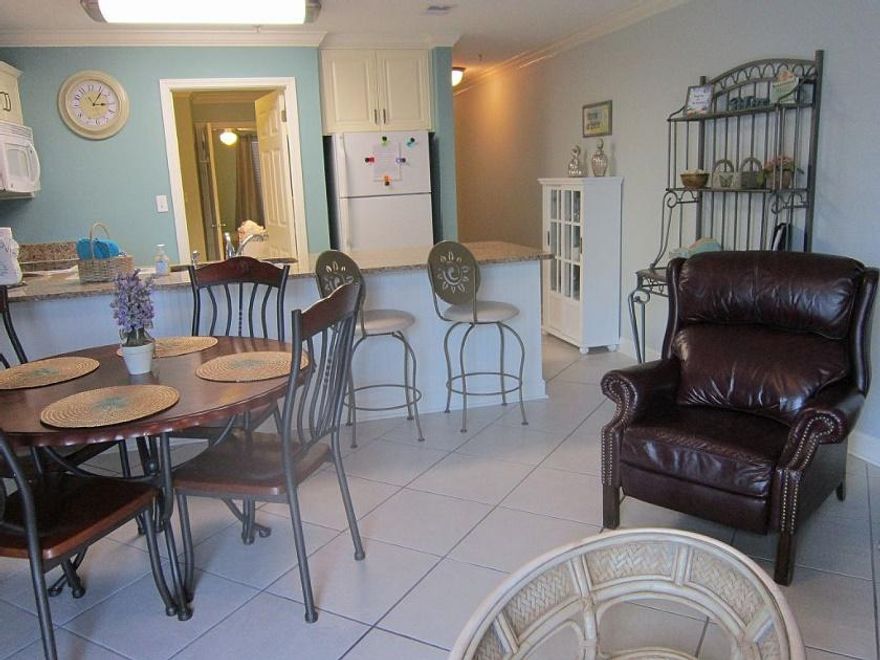 Established super rental unit with an average over the last two years of 20,000 +. This unit has been 'totally' remodeled with new walls, ceilings, granite counters, new vanity and brand new cabinets with slow close drawers in the kitchen. Tiled throughout unit for ease of cleaning and better for wear and tear. The list for improvements to this unit are extensive. This unit location is one of the very best in all of Gulfview. It is situated on the parking area and close to the front near the beach. You can load/unload your car easily through the glass doors of the unit. The Dues are reasonable making this one of the best investments for a great return on rental. There are 2 bunks in the hallway and a sleeper sofa in the living room.