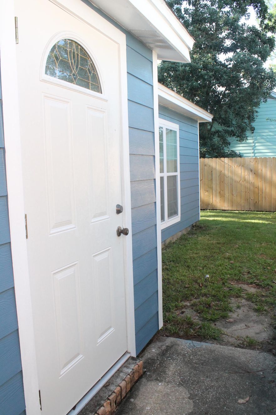 This lovely Florida cottage has been completely remodeled! This charming home boasts a brick fireplace and a cottage dcor including a slatted ceiling. There are vaulted ceilings and decorative architectural accents. The owners have added all new flooring...lovely laminate floors in the main area, carpet and gorgeous tile in the bathrooms. There is also new lighting throughout the house, including under cabinet lights in the kitchen. The generous kitchen has plenty of counter space and all the appliances too. There are three bedrooms and two full baths. The master bedroom has a walk in closet and a newly renovated bathroom. Owner will consider medium or small dogs.$250 non refundable & $250 refundable deposit (per pet)