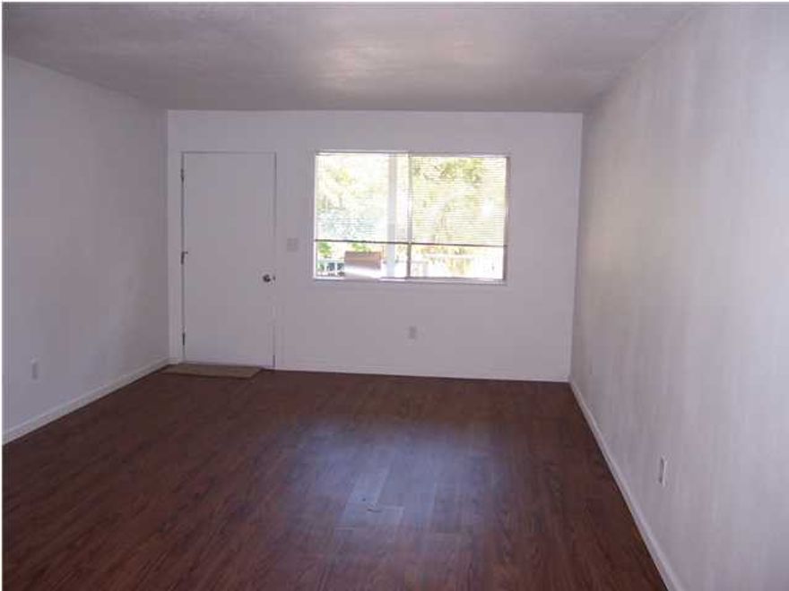 Like new unit with Laminate flooring in Living area, kitchen. NEW CARPET WILL BE INSTALL IN BEDROOSM WITHIN 2 WEEKS. All new Bath Room. Close to College, shops and bases. Spacious open plan. Living Room, Dining/Kitchen area, work area and lots of Cabinets. Master Bedroom has two good size closets. Laundry facilities are available in the complex by Swimming Pool. Rent includes Water. NON SMOKING UNIT. NO PETS. Cable,Internet and Electric is Tenants responsibility,