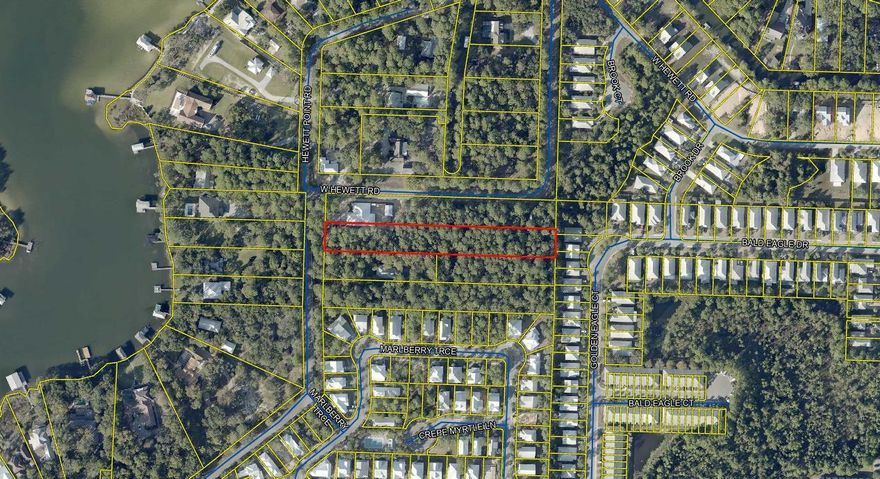Discover a large exceptional building lot located on West Hewett Road, north of Highway 98, in the highly sought-after area near Choctawhatchee Bay and Sandestin. This spacious lot offers a prime opportunity to create your dream home or investment property in a serene and picturesque setting.The lot boasts a generous 1.34 wooded acres with ample room for construction, while providing easy access to the beautiful beaches of 30a & Destin and the vibrant community of Sandestin. Enjoy nearby recreational activities, including boating, fishing, and golfing, as well as an array of dining and shopping options.With its convenient location and potential for bay views, this property is perfect for those looking to embrace the coastal lifestyle. Don't miss your chance to invest in this desirable piece of land on Florida's beautiful Emerald Coast!  (location of lot is mapped incorrectly on zillow)

