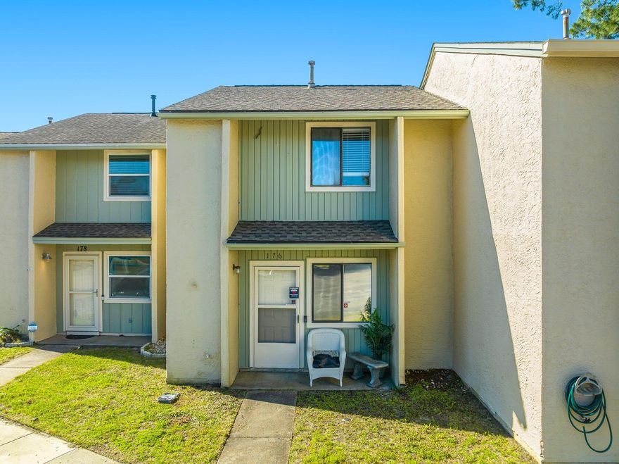 CANAL FRONT property in the Heart of Panama City Beach! Check out this 2 bedroom 2 bath townhome in Gulf Highlands! You will find peace & relaxation in the canal front backyard with plenty of shade. A screened in back porch offers shelter & privacy to enjoy the view in any weather! Inside, the kitchen has been remodeled with new cabinetry, countertops & appliances. Upstairs, bamboo covered floors in both bedrooms. Perfect for a vacation rental investment property or second home! Call today for a private showing! All measurements are approximate.