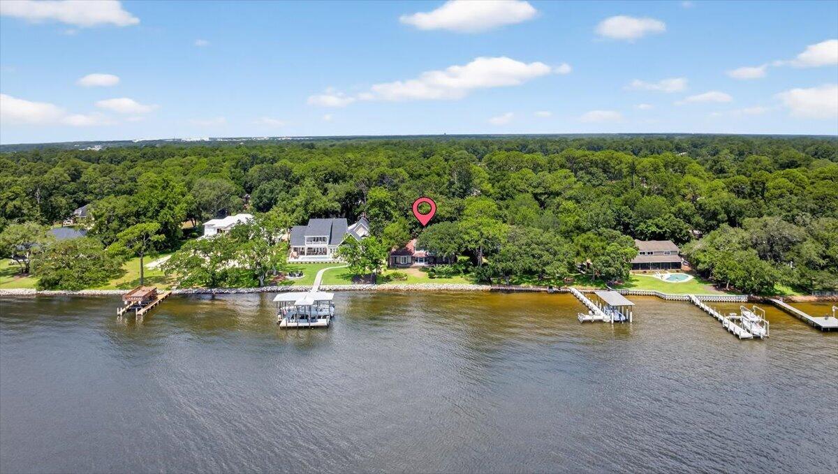 MULTIPLE OFFERS RECEIVED- The deadline to submit highest and best offer is Friday, July 11, 2025.WATERFRONT house with 100' on Rocky Bayou. This location offers a sandy bottom, great for swimming and water depths year round at a minimum of 3-4' , accommodating boats of varying size! Bahia Vista Dr. is a beautiful, tree lined street with large, estate sized lots and offers open water views out back.Don't miss this incredible opportunity to own a waterfront property with endless potential. This home offers a unique chance to renovate or rebuild in a prime location. Enjoy stunning bayou views and the freedom to make it your own.Property is being sold As Is. Buyer to verify all information deemed important.